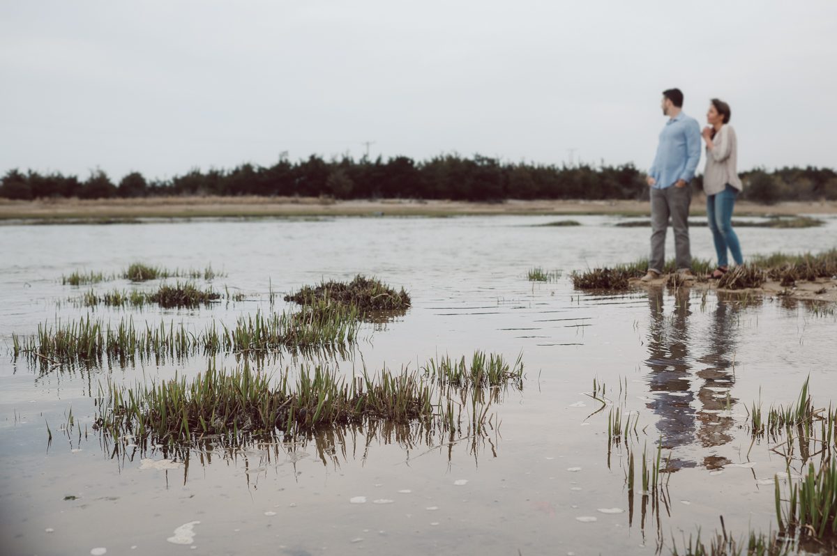 Perfect day would look like this, I said admiring the beach, the landscape and the amazing colors that I was looking out in the horizon. Sky, sea, sand looked as if they were painted in pastel blues, beige, and white. Wind moved, hair dancing, it was going to be fabulous engagement session with Becca and Dan! I fell in love with Sandy Hook Beach, and loved my awesome clients that follows all my weird, silly and sometime awkward directions/posing. My favorite out of Becca and Dan's Sandy Hook engagement session is the one that I got inspired by Wes Anderson's movie "Moonlight Kingdom"! Becca and Dan's Sandy Hook Beach NJ engagement by Karis. Hey Karis is Hudson Valley, Garrison NY and NJ, Fun Weddings and Intimate Elopements Photographer.
