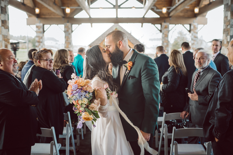 My first wedding of 2022 at Bear Brook Valley NJ celebrating Allie and Nick. It was very cold and windy March day at Bear Brook Valley but Allie and Nick were in their best spirits on their wedding day. Wind made it bit challenging during Allie and Nick's wedding portrait session but instead of fighting against the wind, we worked with the wind's direction becoming one with nature. Allie and Nick smiled, laughed and ran. Quick outdoor ceremony was held out in the front of Bear Brook Valley then for the rest of the evening Allie and Nick with their guests partied, danced in Bear Brook Valley's modern/rustic reception room. Allie and Nick's Bear Brook Valley wedding captured by Karis. Hey Karis is NY, NJ, Brooklyn, Hudson Valley and Catskills Wedding and Elopement Photographer.