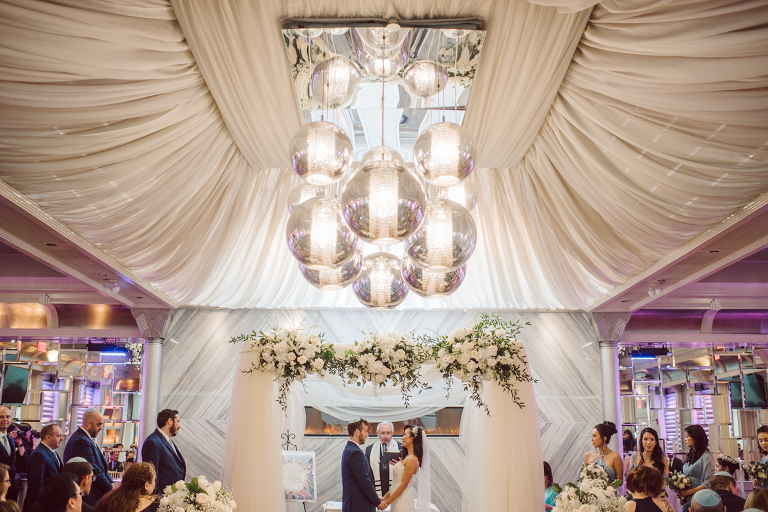 Tiffany and Eric just like all of the other covid couples had to postpone their NY wedding from 2020, then 2021 came and Tiffany and Eric were gifted a daughter! So they postponed their wedding another year to 2022. Tiffany and Eric along with their daughter celebrated their wedding and it was the most sweetest and adorable wedding day ever! The Foundry Wythe Hotel Blue Hill at Stone Barns City Winery Hudson Valley New York Wedding captured by Karis. Hey Karis is NY, NJ, Brooklyn, Hudson Valley and Catskills Wedding and Elopement Photographer.