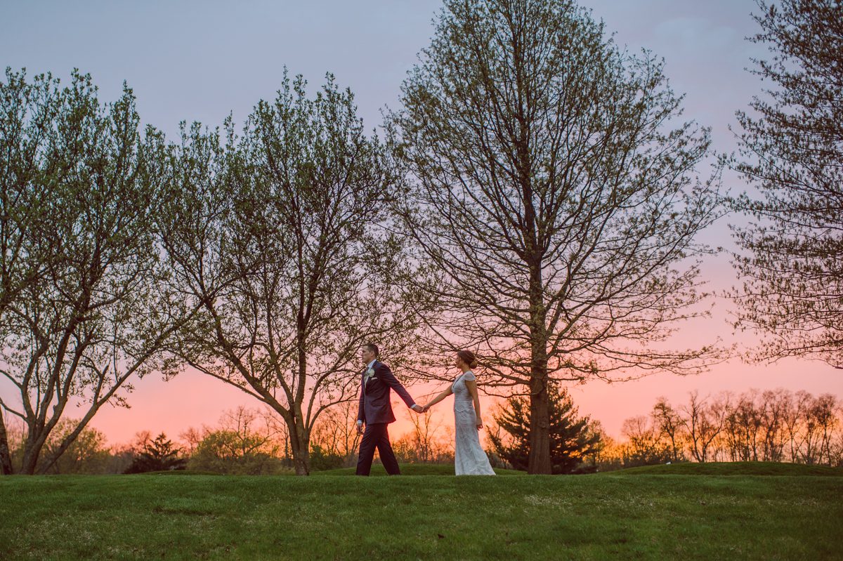 Pulled up to Michell's parents gorgeous mid-century home in Cold Spring, NY on Michelle and Robert's wedding day. And Robert got ready at an airbnb nearby in Peekskill, NY. Even-though Michelle and Robert had some hiccup with their limo the whole village pulled together and transported Michell and Roberts along with their bridal party to the church Our Lady of Loretto Church to get Michelle and Robert married. Then everyone hoped onto everyone's cars to make their way to West Hills Country Club to party. Michelle and Robert weren't too into taking formal posed portraits but instead wanted to join their friends and guests to enjoy their wedding day, to party, to mingle, to drink and eat the food. Many candid moments were captured, and we wrapped the evening with the most stunning sunset across the field at West Hills Country Club. Michelle and Robert's West Hills Country Club Wedding captured by Hey Karis is NY, NJ, Brooklyn, Hudson Valley and Catskills Wedding and Elopement Photographer.