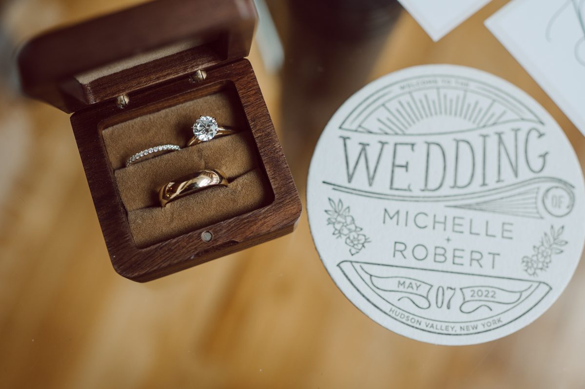 Pulled up to Michell's parents gorgeous mid-century home in Cold Spring, NY on Michelle and Robert's wedding day.  And Robert got ready at an airbnb nearby in Peekskill, NY. Even-though Michelle and Robert had some hiccup with their limo the whole village pulled together and transported Michell and Roberts along with their bridal party to the church Our Lady of Loretto Church to get Michelle and Robert married. Then everyone hoped onto everyone's cars to make their way to West Hills Country Club to party. Michelle and Robert weren't too into taking formal posed portraits but instead wanted to join their friends and guests to enjoy their wedding day, to party, to mingle, to drink and eat the food. Many candid moments were captured, and we wrapped the evening with the most stunning sunset across the field at West Hills Country Club. Michelle and Robert's West Hills Country Club Wedding captured by Hey Karis is NY, NJ, Brooklyn, Hudson Valley and Catskills Wedding and Elopement Photographer.