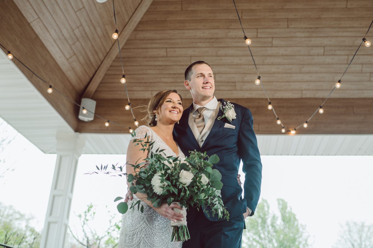 Pulled up to Michell's parents gorgeous mid-century home in Cold Spring, NY on Michelle and Robert's wedding day.  And Robert got ready at an airbnb nearby in Peekskill, NY. Even-though Michelle and Robert had some hiccup with their limo the whole village pulled together and transported Michell and Roberts along with their bridal party to the church Our Lady of Loretto Church to get Michelle and Robert married. Then everyone hoped onto everyone's cars to make their way to West Hills Country Club to party. Michelle and Robert weren't too into taking formal posed portraits but instead wanted to join their friends and guests to enjoy their wedding day, to party, to mingle, to drink and eat the food. Many candid moments were captured, and we wrapped the evening with the most stunning sunset across the field at West Hills Country Club. Michelle and Robert's West Hills Country Club Wedding captured by Hey Karis is NY, NJ, Brooklyn, Hudson Valley and Catskills Wedding and Elopement Photographer.