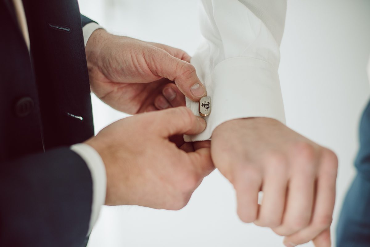 Pulled up to Michell's parents gorgeous mid-century home in Cold Spring, NY on Michelle and Robert's wedding day.  And Robert got ready at an airbnb nearby in Peekskill, NY. Even-though Michelle and Robert had some hiccup with their limo the whole village pulled together and transported Michell and Roberts along with their bridal party to the church Our Lady of Loretto Church to get Michelle and Robert married. Then everyone hoped onto everyone's cars to make their way to West Hills Country Club to party. Michelle and Robert weren't too into taking formal posed portraits but instead wanted to join their friends and guests to enjoy their wedding day, to party, to mingle, to drink and eat the food. Many candid moments were captured, and we wrapped the evening with the most stunning sunset across the field at West Hills Country Club. Michelle and Robert's West Hills Country Club Wedding captured by Hey Karis is NY, NJ, Brooklyn, Hudson Valley and Catskills Wedding and Elopement Photographer.