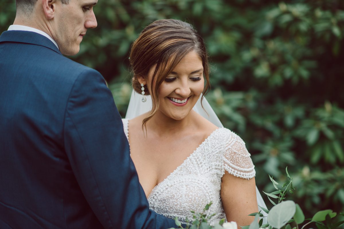 Pulled up to Michell's parents gorgeous mid-century home in Cold Spring, NY on Michelle and Robert's wedding day.  And Robert got ready at an airbnb nearby in Peekskill, NY. Even-though Michelle and Robert had some hiccup with their limo the whole village pulled together and transported Michell and Roberts along with their bridal party to the church Our Lady of Loretto Church to get Michelle and Robert married. Then everyone hoped onto everyone's cars to make their way to West Hills Country Club to party. Michelle and Robert weren't too into taking formal posed portraits but instead wanted to join their friends and guests to enjoy their wedding day, to party, to mingle, to drink and eat the food. Many candid moments were captured, and we wrapped the evening with the most stunning sunset across the field at West Hills Country Club. Michelle and Robert's West Hills Country Club Wedding captured by Hey Karis is NY, NJ, Brooklyn, Hudson Valley and Catskills Wedding and Elopement Photographer.