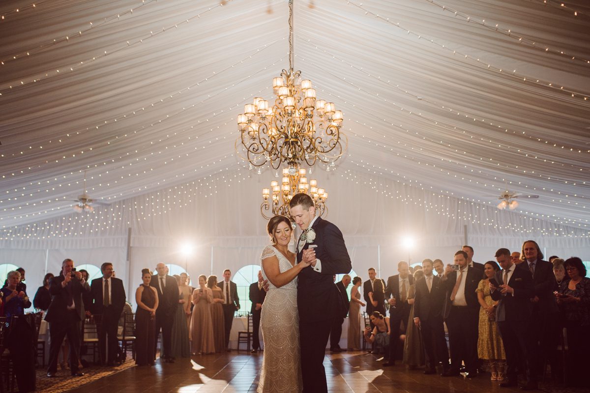 Pulled up to Michell's parents gorgeous mid-century home in Cold Spring, NY on Michelle and Robert's wedding day. And Robert got ready at an airbnb nearby in Peekskill, NY. Even-though Michelle and Robert had some hiccup with their limo the whole village pulled together and transported Michell and Roberts along with their bridal party to the church Our Lady of Loretto Church to get Michelle and Robert married. Then everyone hoped onto everyone's cars to make their way to West Hills Country Club to party. Michelle and Robert weren't too into taking formal posed portraits but instead wanted to join their friends and guests to enjoy their wedding day, to party, to mingle, to drink and eat the food. Many candid moments were captured, and we wrapped the evening with the most stunning sunset across the field at West Hills Country Club. Michelle and Robert's West Hills Country Club Wedding captured by Hey Karis is NY, NJ, Brooklyn, Hudson Valley and Catskills Wedding and Elopement Photographer.