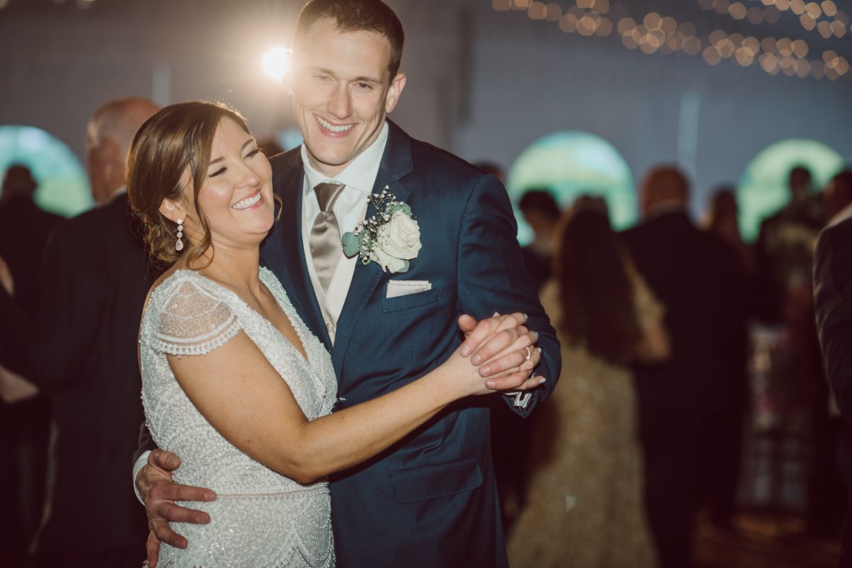 Pulled up to Michell's parents gorgeous mid-century home in Cold Spring, NY on Michelle and Robert's wedding day.  And Robert got ready at an airbnb nearby in Peekskill, NY. Even-though Michelle and Robert had some hiccup with their limo the whole village pulled together and transported Michell and Roberts along with their bridal party to the church Our Lady of Loretto Church to get Michelle and Robert married. Then everyone hoped onto everyone's cars to make their way to West Hills Country Club to party. Michelle and Robert weren't too into taking formal posed portraits but instead wanted to join their friends and guests to enjoy their wedding day, to party, to mingle, to drink and eat the food. Many candid moments were captured, and we wrapped the evening with the most stunning sunset across the field at West Hills Country Club. Michelle and Robert's West Hills Country Club Wedding captured by Hey Karis is NY, NJ, Brooklyn, Hudson Valley and Catskills Wedding and Elopement Photographer.