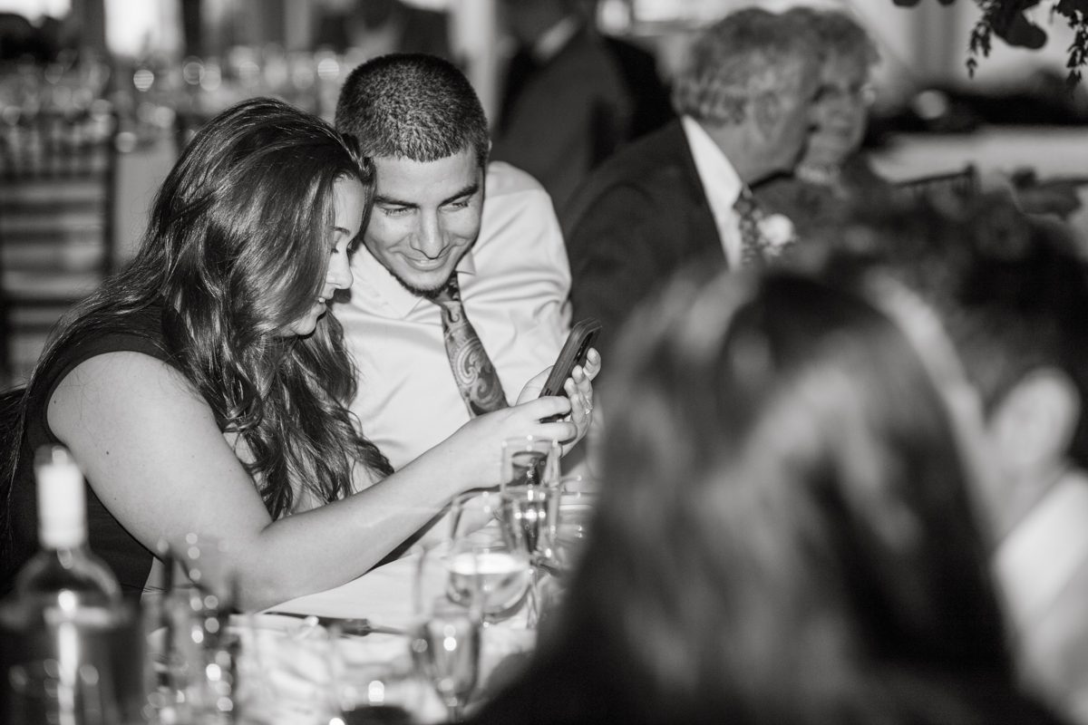 Pulled up to Michell's parents gorgeous mid-century home in Cold Spring, NY on Michelle and Robert's wedding day.  And Robert got ready at an airbnb nearby in Peekskill, NY. Even-though Michelle and Robert had some hiccup with their limo the whole village pulled together and transported Michell and Roberts along with their bridal party to the church Our Lady of Loretto Church to get Michelle and Robert married. Then everyone hoped onto everyone's cars to make their way to West Hills Country Club to party. Michelle and Robert weren't too into taking formal posed portraits but instead wanted to join their friends and guests to enjoy their wedding day, to party, to mingle, to drink and eat the food. Many candid moments were captured, and we wrapped the evening with the most stunning sunset across the field at West Hills Country Club. Michelle and Robert's West Hills Country Club Wedding captured by Hey Karis is NY, NJ, Brooklyn, Hudson Valley and Catskills Wedding and Elopement Photographer.