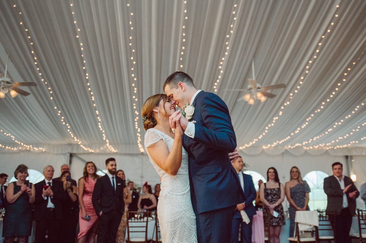Pulled up to Michell's parents gorgeous mid-century home in Cold Spring, NY on Michelle and Robert's wedding day. And Robert got ready at an airbnb nearby in Peekskill, NY. Even-though Michelle and Robert had some hiccup with their limo the whole village pulled together and transported Michell and Roberts along with their bridal party to the church Our Lady of Loretto Church to get Michelle and Robert married. Then everyone hoped onto everyone's cars to make their way to West Hills Country Club to party. Michelle and Robert weren't too into taking formal posed portraits but instead wanted to join their friends and guests to enjoy their wedding day, to party, to mingle, to drink and eat the food. Many candid moments were captured, and we wrapped the evening with the most stunning sunset across the field at West Hills Country Club. Michelle and Robert's West Hills Country Club Wedding captured by Hey Karis is NY, NJ, Brooklyn, Hudson Valley and Catskills Wedding and Elopement Photographer.