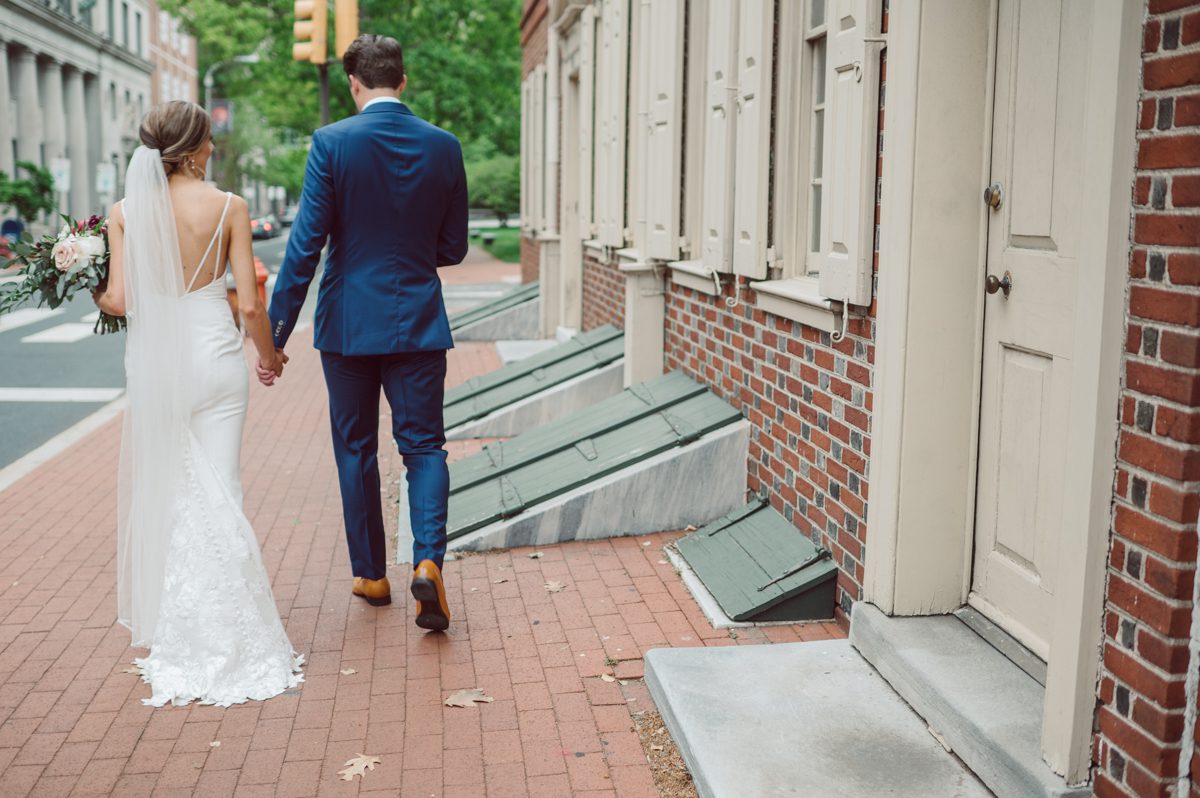  Lisa and Jon each got ready downtown Philly. Lisa at Philadelphia Marriott Old City and Jon at an airbnb on Ludlow Street Philly. Lisa and Jon got photo permit to all the gardens and landmarks near Union Trust. First look at 18th Century Garden then wedding photos at Rose Garden, Merchants Exchange Building, Front steps of First Bank and final photos in front of City Hall. Then we headed back to Union Trust to get Lisa and Jon married then to party like rock stars! Lisa and Jon's Union Trust Philadelphia wedding captured by Hey Karis is NY, NJ, Brooklyn, Hudson Valley and Catskills Wedding and Elopement Photographer.