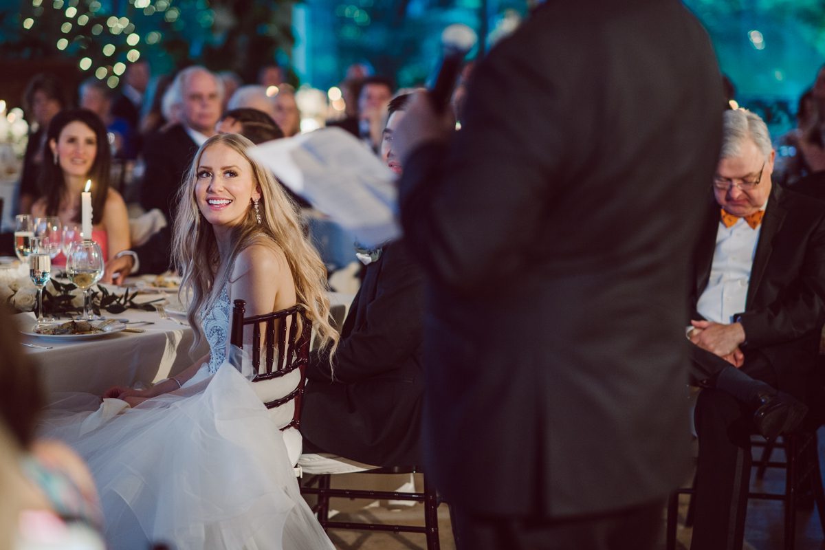 In beautiful Princeton, NJ sits Jasna Polana. This unique wedding venue which is part of TPC Jasna Polana Country Club with it's Tuscany like exterior with cobble stone circular entry way with ground fountain. You'll feel like a royal family when you get married here. It was raining on Hillary and Will's wedding day, so we didn't get to explore the grounds as much as we would have like to but this brave bride Hillary was willing to go out into the rain for outdoor photos on her wedding day. Incredible colors with all the greens, white flowers from the back garden, Hillary's white wedding dress created such a romantic contrast against the deep greens, blues it was such a incredible day. I had such a fun time capturing Hillary and Will on their wedding day at Jasna Polana and can not wait to come back to this gorgeous venue on a dry day to capture more moments. Hillary and Will's Jasna Polana Princeton NJ wedding  captured by Karis from Hey Karis NY, NJ, Brooklyn, Hudson Valley and Catskills Wedding and Elopement Photographer.