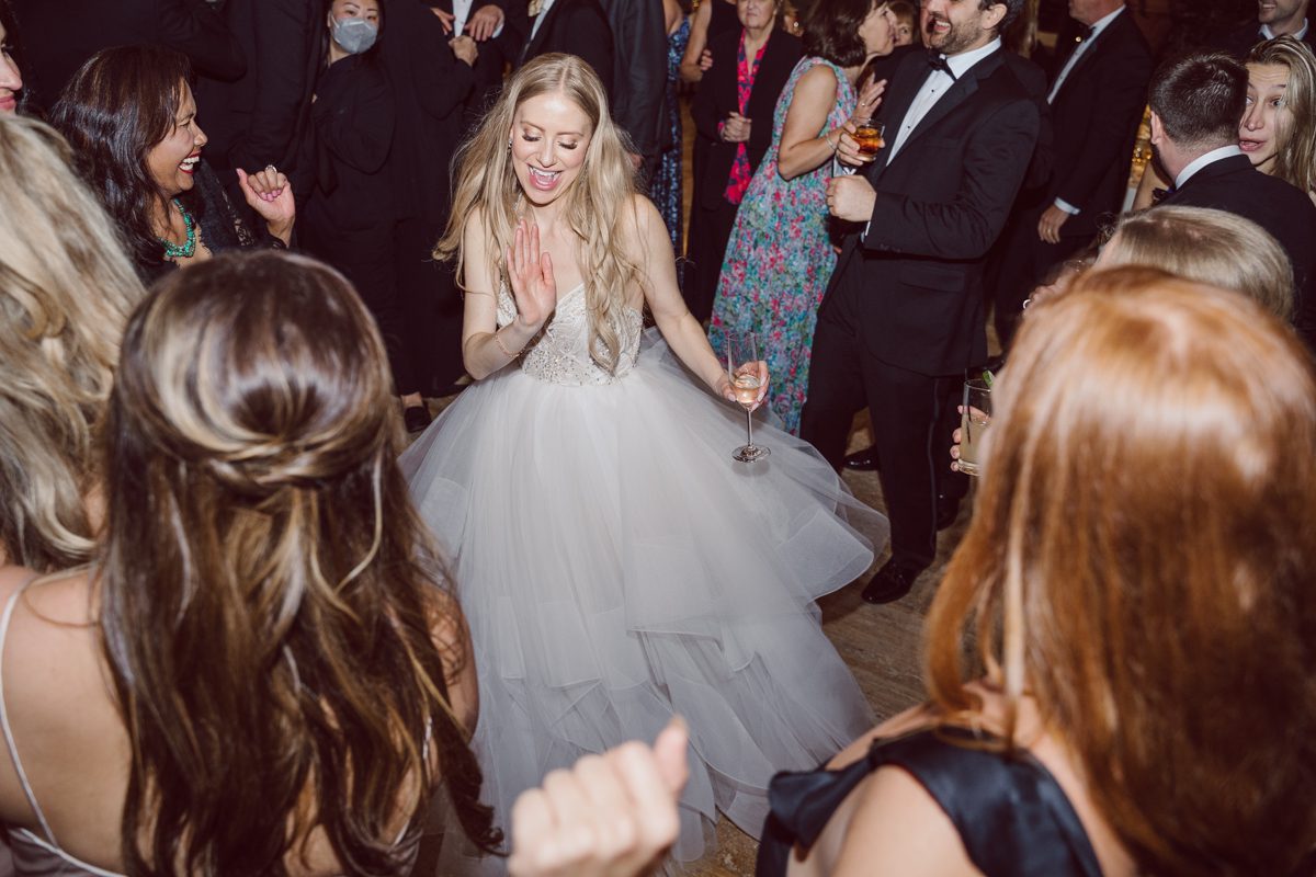 In beautiful Princeton, NJ sits Jasna Polana. This unique wedding venue which is part of TPC Jasna Polana Country Club with it's Tuscany like exterior with cobble stone circular entry way with ground fountain. You'll feel like a royal family when you get married here. It was raining on Hillary and Will's wedding day, so we didn't get to explore the grounds as much as we would have like to but this brave bride Hillary was willing to go out into the rain for outdoor photos on her wedding day. Incredible colors with all the greens, white flowers from the back garden, Hillary's white wedding dress created such a romantic contrast against the deep greens, blues it was such a incredible day. I had such a fun time capturing Hillary and Will on their wedding day at Jasna Polana and can not wait to come back to this gorgeous venue on a dry day to capture more moments. Hillary and Will's Jasna Polana Princeton NJ wedding captured by Karis from Hey Karis NY, NJ, Brooklyn, Hudson Valley and Catskills Wedding and Elopement Photographer.