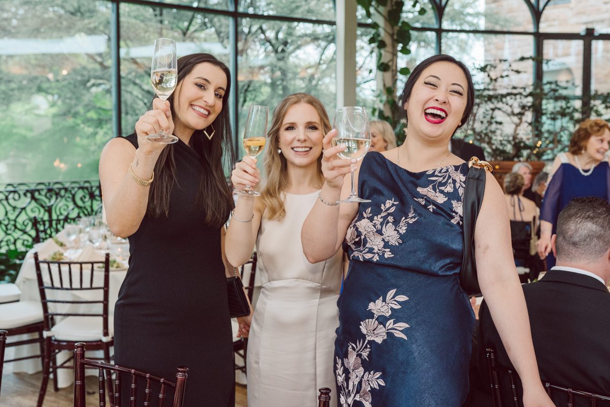 In beautiful Princeton, NJ sits Jasna Polana. This unique wedding venue which is part of TPC Jasna Polana Country Club with it's Tuscany like exterior with cobble stone circular entry way with ground fountain. You'll feel like a royal family when you get married here. It was raining on Hillary and Will's wedding day, so we didn't get to explore the grounds as much as we would have like to but this brave bride Hillary was willing to go out into the rain for outdoor photos on her wedding day. Incredible colors with all the greens, white flowers from the back garden, Hillary's white wedding dress created such a romantic contrast against the deep greens, blues it was such a incredible day. I had such a fun time capturing Hillary and Will on their wedding day at Jasna Polana and can not wait to come back to this gorgeous venue on a dry day to capture more moments. Hillary and Will's Jasna Polana Princeton NJ wedding captured by Karis from Hey Karis NY, NJ, Brooklyn, Hudson Valley and Catskills Wedding and Elopement Photographer.