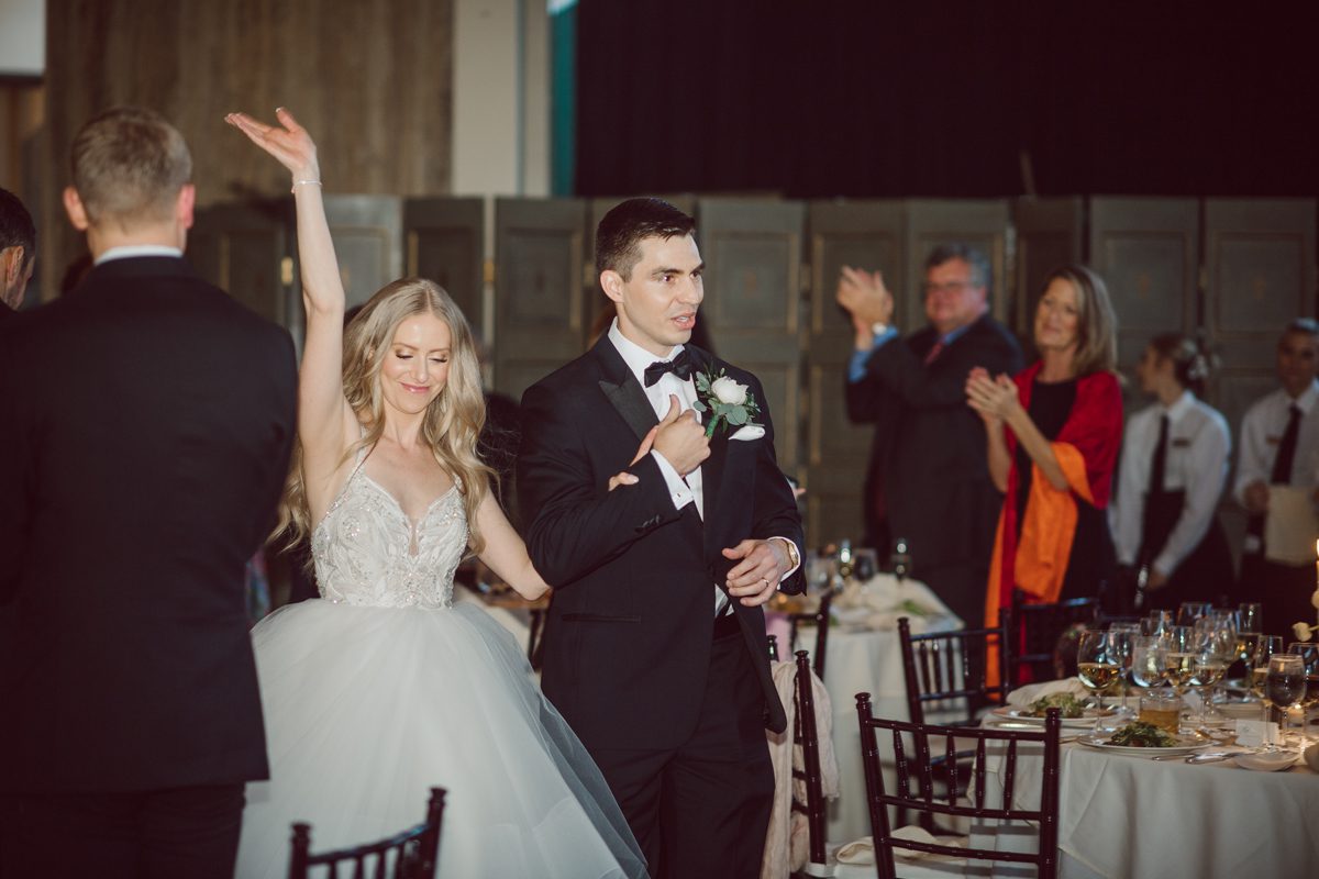 In beautiful Princeton, NJ sits Jasna Polana. This unique wedding venue which is part of TPC Jasna Polana Country Club with it's Tuscany like exterior with cobble stone circular entry way with ground fountain. You'll feel like a royal family when you get married here. It was raining on Hillary and Will's wedding day, so we didn't get to explore the grounds as much as we would have like to but this brave bride Hillary was willing to go out into the rain for outdoor photos on her wedding day. Incredible colors with all the greens, white flowers from the back garden, Hillary's white wedding dress created such a romantic contrast against the deep greens, blues it was such a incredible day. I had such a fun time capturing Hillary and Will on their wedding day at Jasna Polana and can not wait to come back to this gorgeous venue on a dry day to capture more moments. Hillary and Will's Jasna Polana Princeton NJ wedding  captured by Karis from Hey Karis NY, NJ, Brooklyn, Hudson Valley and Catskills Wedding and Elopement Photographer.