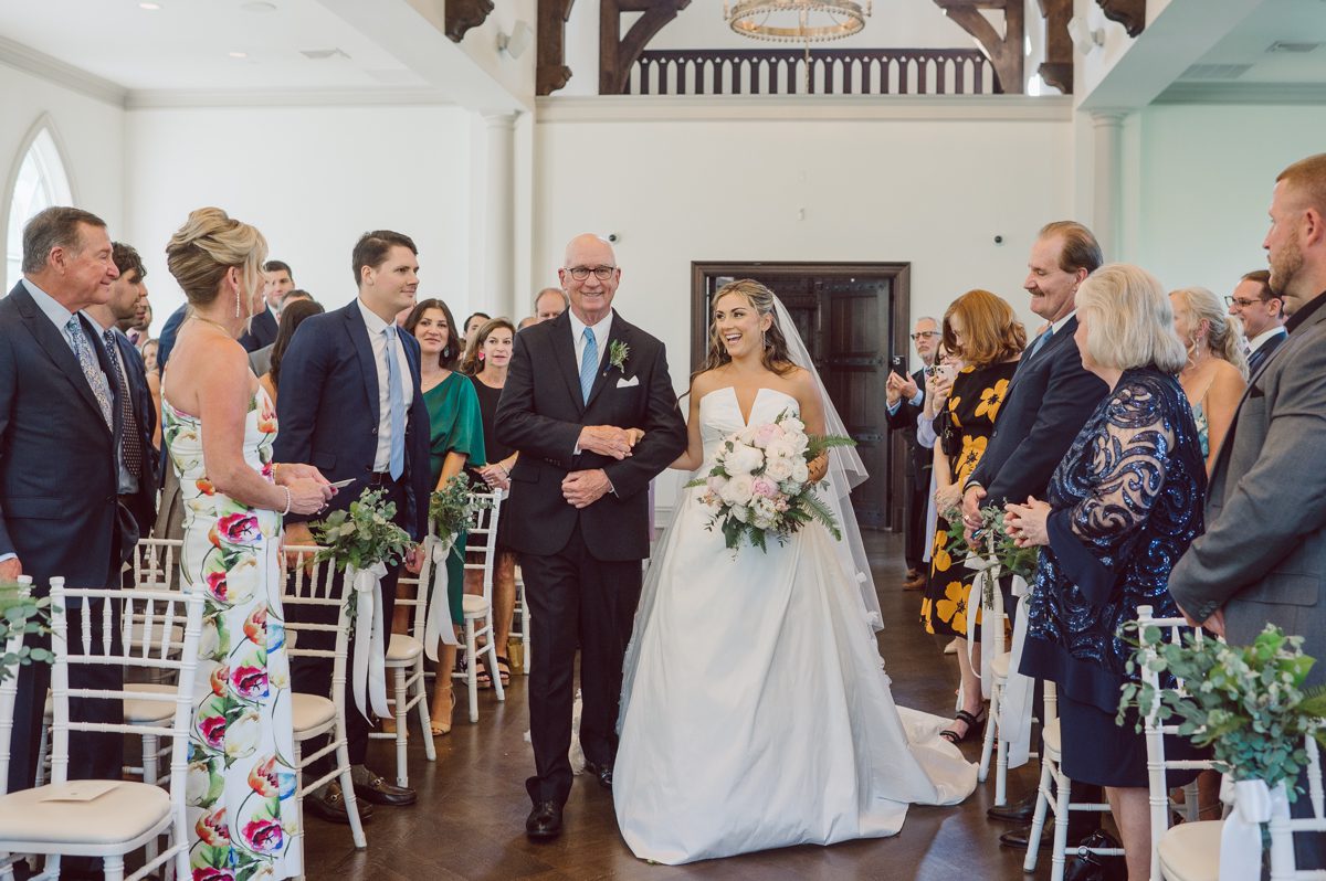 It literally felt like 1000 degrees on Faith and Joe’s wedding at Park Chateau Estate and Gardens. Sun was out and had no plan to hide, not a single cloud in the sky. Despite the gorgeous gardens at Park Chateau Faith and Joe decide to stay cool and alive indoors. I totally don’t blame them, I would much rather be indoor with AC. Thankfully the bridal and groom’s suite at Park Chateau Estate and Gardens is very photogenic with lots of windows. I fully utilized the bridal suite for faith’s getting ready, formal photos with her bridesmaids, first look with her father and her solo photos all before the ceremony. Ceremony was held at the chapel onsite at Park Chateau making everything easy. After the ceremony Faith and Joe did quick few photos outside, some family and group photos then quickly ran indoors before they melted onto the beautiful gardens of Park Chateau. The reception room was filled with peonies and cherry branches it was gorgeous, perfect HOT spring wedding decor. Faith and Joe enjoyed their wedding day the way they wanted by eating drinking and dancing mingling with their guests inside under Cool AC. Faith and Joe’s Park Chateau Estate and Gardens Wedding captured by Karis from Hey Karis NY, NJ, Brooklyn, Hudson Valley and Catskills Wedding and Elopement Photographer.