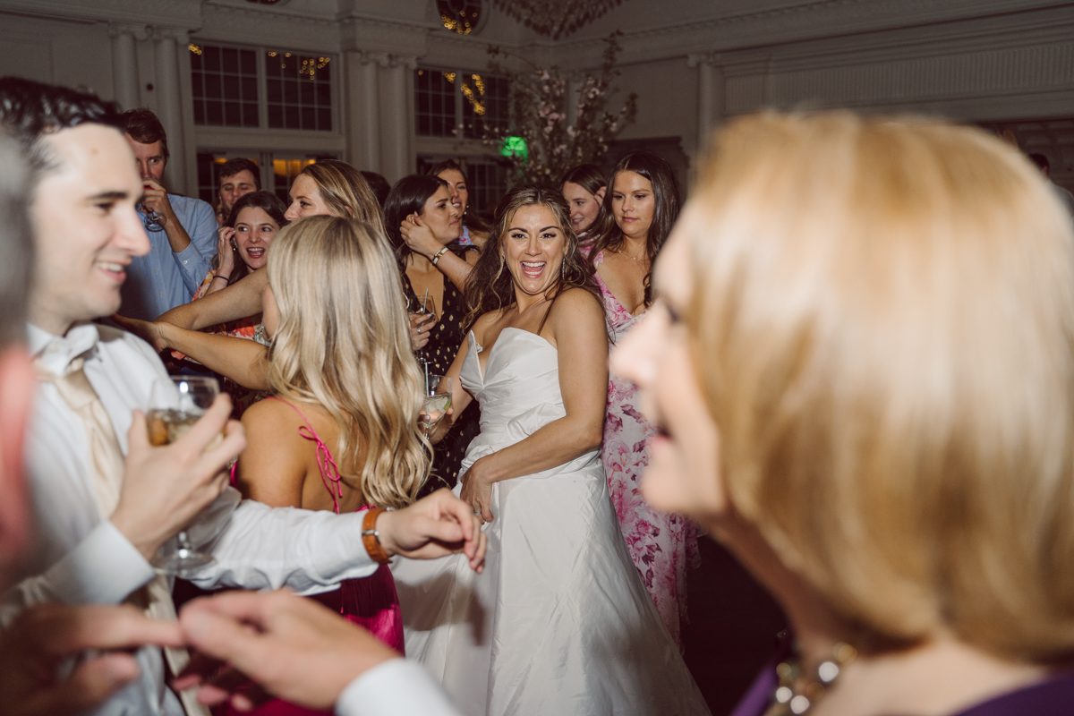 It literally felt like 1000 degrees on Faith and Joe’s wedding at Park Chateau Estate and Gardens. Sun was out and had no plan to hide, not a single cloud in the sky. Despite the gorgeous gardens at Park Chateau Faith and Joe decide to stay cool and alive indoors. I totally don’t blame them, I would much rather be indoor with AC. Thankfully the bridal and groom’s suite at Park Chateau Estate and Gardens is very photogenic with lots of windows. I fully utilized the bridal suite for faith’s getting ready, formal photos with her bridesmaids, first look with her father and her solo photos all before the ceremony. Ceremony was held at the chapel onsite at Park Chateau making everything easy. After the ceremony Faith and Joe did quick few photos outside, some family and group photos then quickly ran indoors before they melted onto the beautiful gardens of Park Chateau. The reception room was filled with peonies and cherry branches it was gorgeous, perfect HOT spring wedding decor. Faith and Joe enjoyed their wedding day the way they wanted by eating drinking and dancing mingling with their guests inside under Cool AC. Faith and Joe’s Park Chateau Estate and Gardens Wedding captured by Karis from Hey Karis NY, NJ, Brooklyn, Hudson Valley and Catskills Wedding and Elopement Photographer.