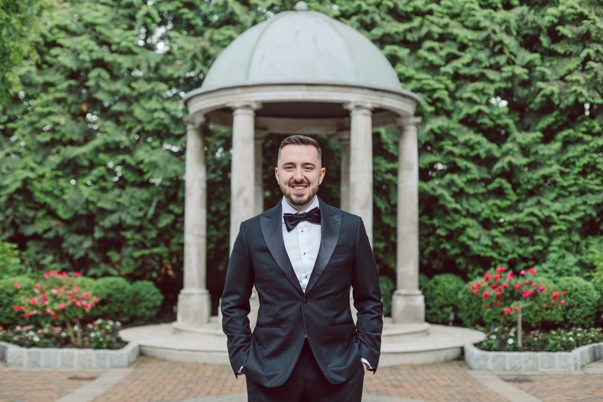 At Florentine Gardens in River Vale NJ celebrating Sam and Mike's wedding. Here at Florentine Gardens you'll get your amazing ballroom, gorgeous landscaped garden and during Sam and Mike's wedding day the roses were in full bloom it was truly beautiful. With roses in full bloom at the rose garden in Florentine Gardens, Sam and Mike's outdoor wedding ceremony was gorgeous bit hot but so gorgeous. And we were fully able to enjoy the roses during Sam and Mike's wedding portrait session. Sam and Mike's Florentine Gardens, NJ wedding captured by Karis from Hey Karis NY, NJ, Brooklyn, Hudson Valley and Catskills Wedding and Elopement Photographer.