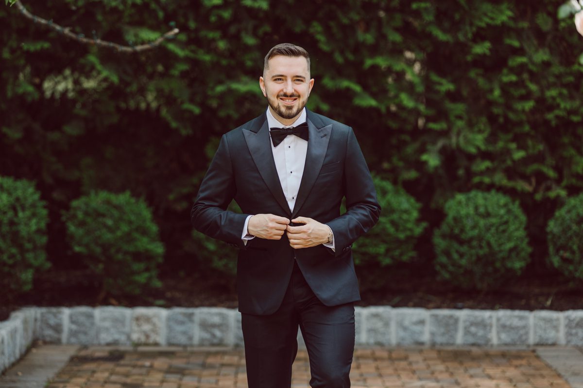 At Florentine Gardens in River Vale NJ celebrating Sam and Mike's wedding. Here at Florentine Gardens you'll get your amazing ballroom, gorgeous landscaped garden and during Sam and Mike's wedding day the roses were in full bloom it was truly beautiful. With roses in full bloom at the rose garden in Florentine Gardens, Sam and Mike's outdoor wedding ceremony was gorgeous bit hot but so gorgeous. And we were fully able to enjoy the roses during Sam and Mike's wedding portrait session. Sam and Mike's Florentine Gardens, NJ wedding captured by Karis from Hey Karis NY, NJ, Brooklyn, Hudson Valley and Catskills Wedding and Elopement Photographer.