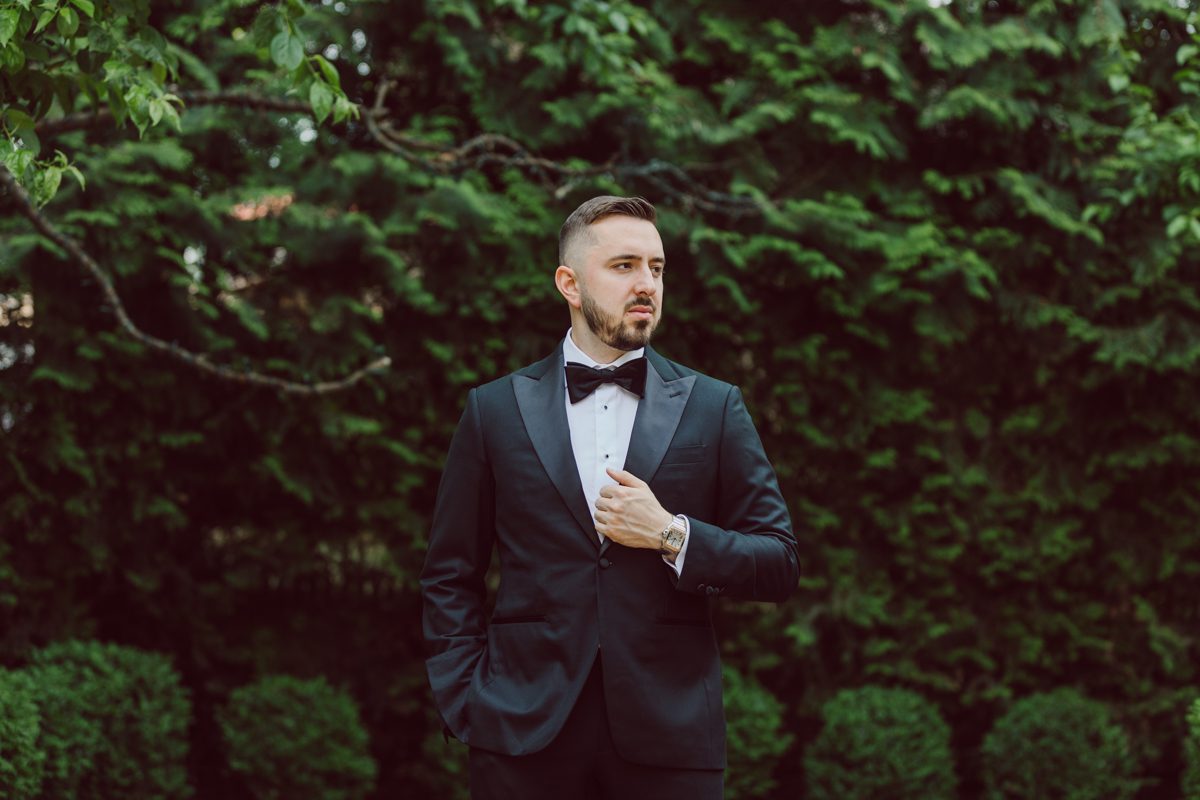 At Florentine Gardens in River Vale NJ celebrating Sam and Mike's wedding. Here at Florentine Gardens you'll get your amazing ballroom, gorgeous landscaped garden and during Sam and Mike's wedding day the roses were in full bloom it was truly beautiful. With roses in full bloom at the rose garden in Florentine Gardens, Sam and Mike's outdoor wedding ceremony was gorgeous bit hot but so gorgeous. And we were fully able to enjoy the roses during Sam and Mike's wedding portrait session. Sam and Mike's Florentine Gardens, NJ wedding captured by Karis from Hey Karis NY, NJ, Brooklyn, Hudson Valley and Catskills Wedding and Elopement Photographer.