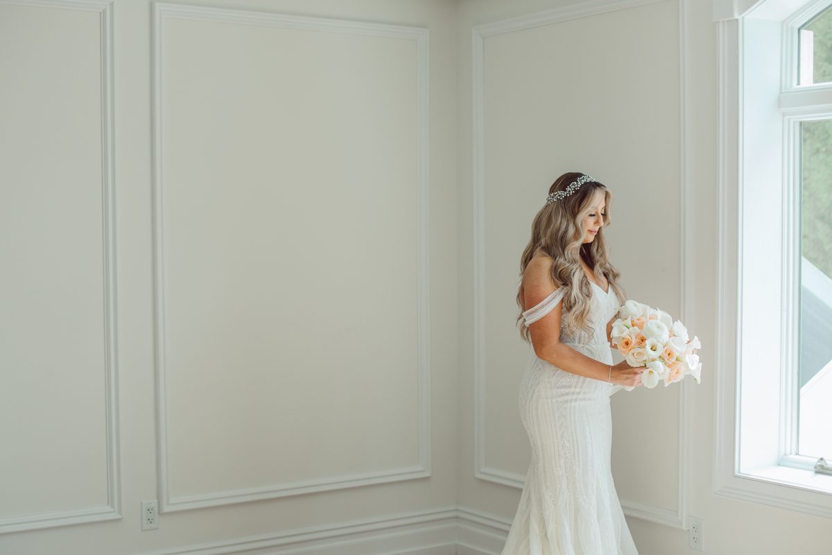 At Florentine Gardens in River Vale NJ celebrating Sam and Mike's wedding. Here at Florentine Gardens you'll get your amazing ballroom, gorgeous landscaped garden and during Sam and Mike's wedding day the roses were in full bloom it was truly beautiful. With roses in full bloom at the rose garden in Florentine Gardens, Sam and Mike's outdoor wedding ceremony was gorgeous bit hot but so gorgeous. And we were fully able to enjoy the roses during Sam and Mike's wedding portrait session. Sam and Mike's Florentine Gardens, NJ wedding captured by Karis from Hey Karis NY, NJ, Brooklyn, Hudson Valley and Catskills Wedding and Elopement Photographer.