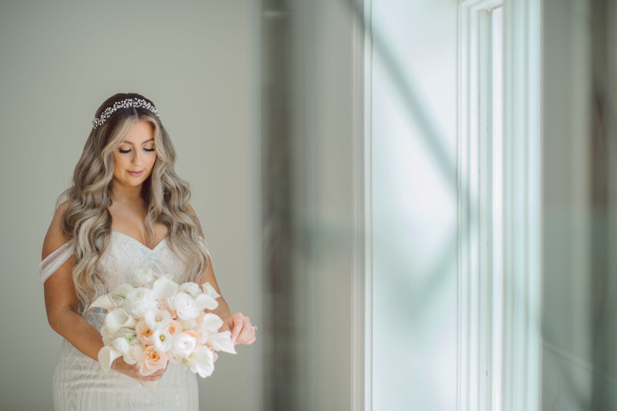 At Florentine Gardens in River Vale NJ celebrating Sam and Mike's wedding. Here at Florentine Gardens you'll get your amazing ballroom, gorgeous landscaped garden and during Sam and Mike's wedding day the roses were in full bloom it was truly beautiful. With roses in full bloom at the rose garden in Florentine Gardens, Sam and Mike's outdoor wedding ceremony was gorgeous bit hot but so gorgeous. And we were fully able to enjoy the roses during Sam and Mike's wedding portrait session. Sam and Mike's Florentine Gardens, NJ wedding captured by Karis from Hey Karis NY, NJ, Brooklyn, Hudson Valley and Catskills Wedding and Elopement Photographer.