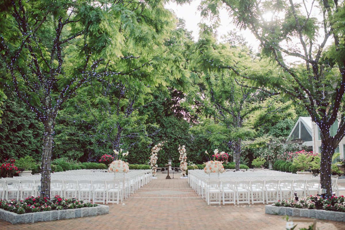 At Florentine Gardens in River Vale NJ celebrating Sam and Mike's wedding. Here at Florentine Gardens you'll get your amazing ballroom, gorgeous landscaped garden and during Sam and Mike's wedding day the roses were in full bloom it was truly beautiful. With roses in full bloom at the rose garden in Florentine Gardens, Sam and Mike's outdoor wedding ceremony was gorgeous bit hot but so gorgeous. And we were fully able to enjoy the roses during Sam and Mike's wedding portrait session. Sam and Mike's Florentine Gardens, NJ wedding captured by Karis from Hey Karis NY, NJ, Brooklyn, Hudson Valley and Catskills Wedding and Elopement Photographer.