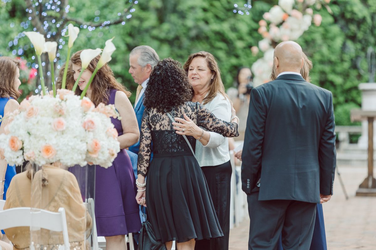 At Florentine Gardens in River Vale NJ celebrating Sam and Mike's wedding. Here at Florentine Gardens you'll get your amazing ballroom, gorgeous landscaped garden and during Sam and Mike's wedding day the roses were in full bloom it was truly beautiful. With roses in full bloom at the rose garden in Florentine Gardens, Sam and Mike's outdoor wedding ceremony was gorgeous bit hot but so gorgeous. And we were fully able to enjoy the roses during Sam and Mike's wedding portrait session. Sam and Mike's Florentine Gardens, NJ wedding captured by Karis from Hey Karis NY, NJ, Brooklyn, Hudson Valley and Catskills Wedding and Elopement Photographer.