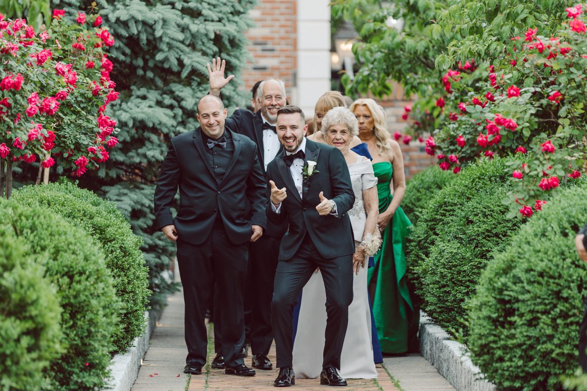 At Florentine Gardens in River Vale NJ celebrating Sam and Mike's wedding. Here at Florentine Gardens you'll get your amazing ballroom, gorgeous landscaped garden and during Sam and Mike's wedding day the roses were in full bloom it was truly beautiful. With roses in full bloom at the rose garden in Florentine Gardens, Sam and Mike's outdoor wedding ceremony was gorgeous bit hot but so gorgeous. And we were fully able to enjoy the roses during Sam and Mike's wedding portrait session. Sam and Mike's Florentine Gardens, NJ wedding captured by Karis from Hey Karis NY, NJ, Brooklyn, Hudson Valley and Catskills Wedding and Elopement Photographer.