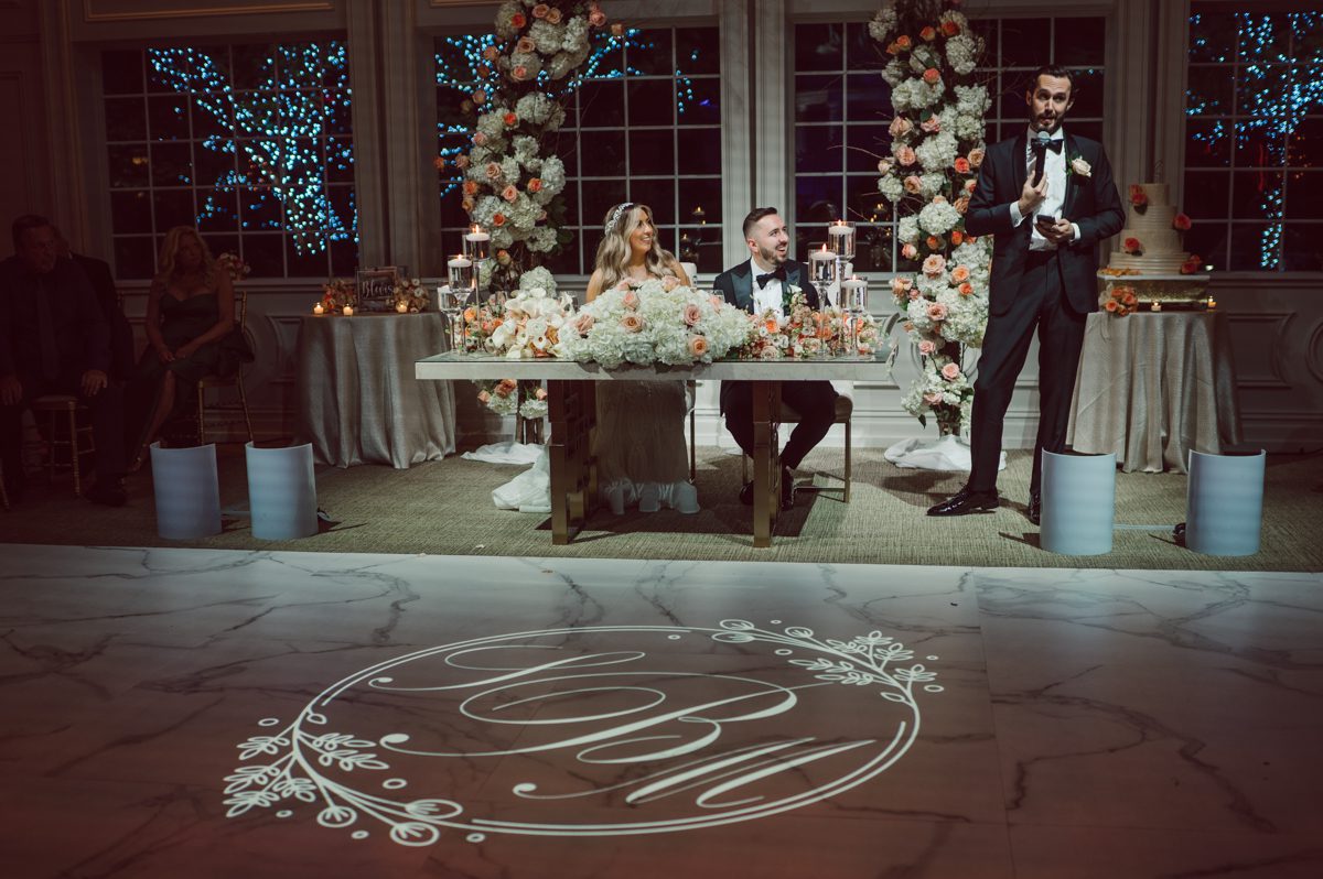 At Florentine Gardens in River Vale NJ celebrating Sam and Mike's wedding. Here at Florentine Gardens you'll get your amazing ballroom, gorgeous landscaped garden and during Sam and Mike's wedding day the roses were in full bloom it was truly beautiful. With roses in full bloom at the rose garden in Florentine Gardens, Sam and Mike's outdoor wedding ceremony was gorgeous bit hot but so gorgeous. And we were fully able to enjoy the roses during Sam and Mike's wedding portrait session. Sam and Mike's Florentine Gardens, NJ wedding captured by Karis from Hey Karis NY, NJ, Brooklyn, Hudson Valley and Catskills Wedding and Elopement Photographer.