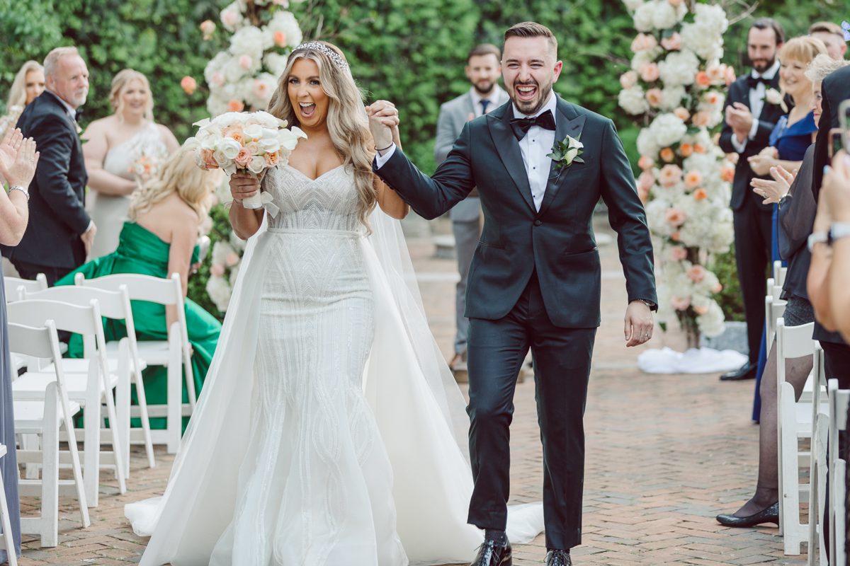 At Florentine Gardens in River Vale NJ celebrating Sam and Mike's wedding. Here at Florentine Gardens you'll get your amazing ballroom, gorgeous landscaped garden and during Sam and Mike's wedding day the roses were in full bloom it was truly beautiful. With roses in full bloom at the rose garden in Florentine Gardens, Sam and Mike's outdoor wedding ceremony was gorgeous bit hot but so gorgeous. And we were fully able to enjoy the roses during Sam and Mike's wedding portrait session. Sam and Mike's Florentine Gardens, NJ wedding captured by Karis from Hey Karis NY, NJ, Brooklyn, Hudson Valley and Catskills Wedding and Elopement Photographer.