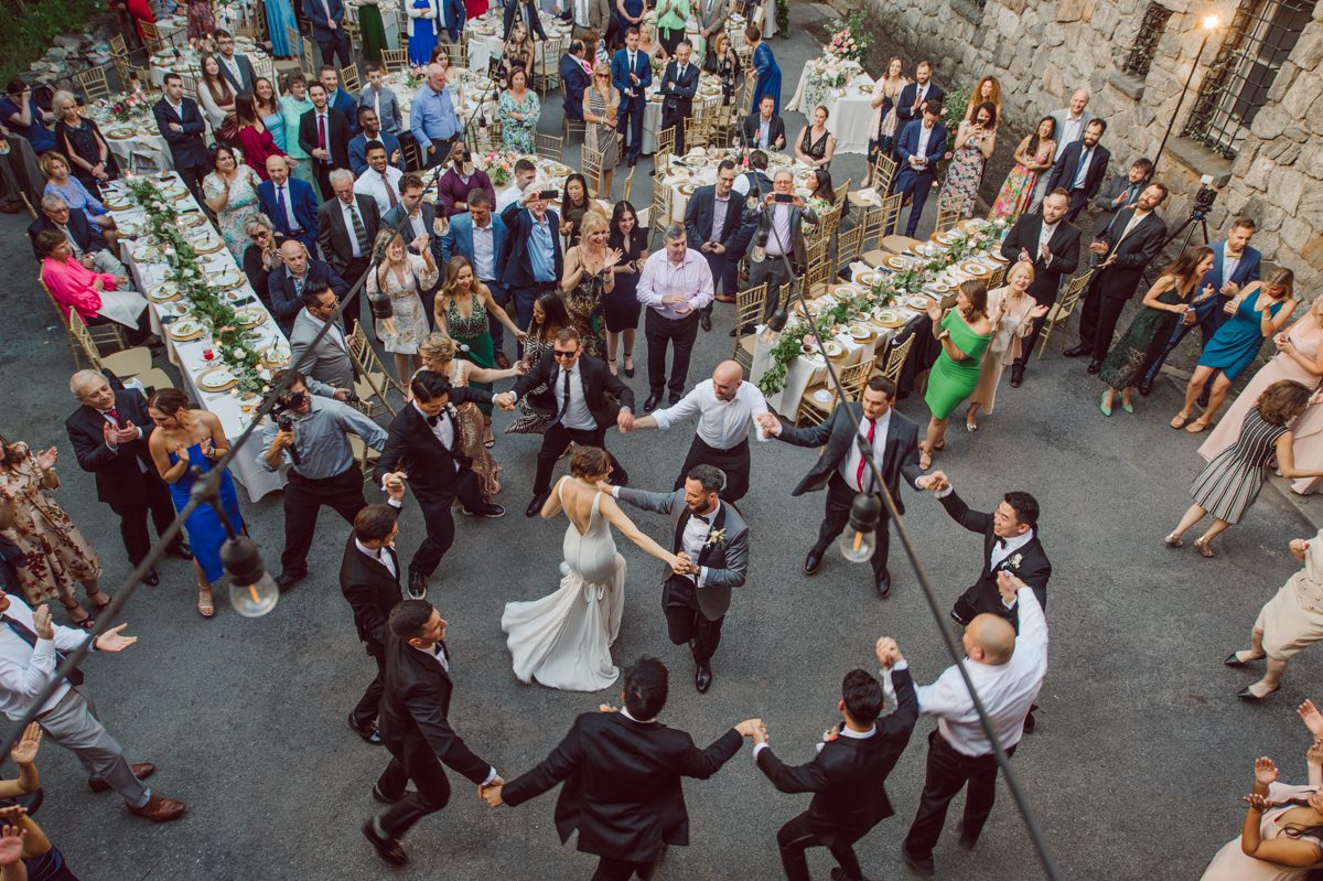 Arrow Park, a wedding venue located in Monroe NY along the Hudson Valley is truly a magical place to celebrate your wedding in a relaxing environment. Your family and friends will appreciate this unplug, retreat type of environment surrounded by nature, historic mansion with courtyard for an outdoor wedding under cafe lights, Arrow Lake, and beautiful garden. I love this place, I can come here every weekend! And Jackie and Aron were the perfect couple for this magical venue to get married and dance away the beautiful summer evening under the cafe light in their courtyard. It was like a scene from a movie, or a wedding from chateau in Italy. Jackie and Aron's Arrow Park, NY Hudson Valley NY wedding captured by Karis from Hey Karis NY, NJ, Brooklyn, Hudson Valley and Catskills Wedding and Elopement Photographer.