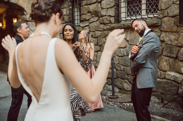 Arrow Park, a wedding venue located in Monroe NY along the Hudson Valley is truly a magical place to celebrate your wedding in a relaxing environment. Your family and friends will appreciate this unplug, retreat type of environment surrounded by nature, historic mansion with courtyard for an outdoor wedding under cafe lights, Arrow Lake, and beautiful garden. I love this place, I can come here every weekend! And Jackie and Aron were the perfect couple for this magical venue to get married and dance away the beautiful summer evening under the cafe light in their courtyard. It was like a scene from a movie, or a wedding from chateau in Italy. Jackie and Aron's Arrow Park, NY Hudson Valley NY wedding captured by Karis from Hey Karis NY, NJ, Brooklyn, Hudson Valley and Catskills Wedding and Elopement Photographer.