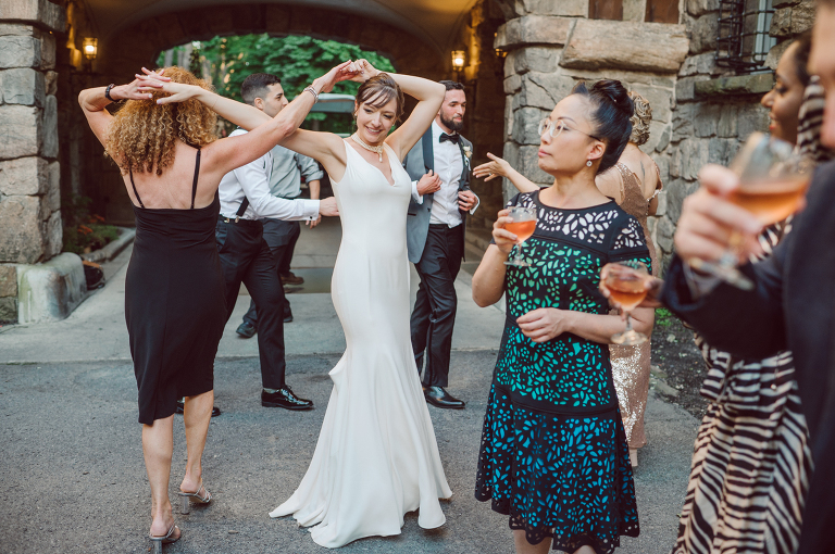 Arrow Park, a wedding venue located in Monroe NY along the Hudson Valley is truly a magical place to celebrate your wedding in a relaxing environment. Your family and friends will appreciate this unplug, retreat type of environment surrounded by nature, historic mansion with courtyard for an outdoor wedding under cafe lights, Arrow Lake, and beautiful garden. I love this place, I can come here every weekend! And Jackie and Aron were the perfect couple for this magical venue to get married and dance away the beautiful summer evening under the cafe light in their courtyard. It was like a scene from a movie, or a wedding from chateau in Italy. Jackie and Aron's Arrow Park, NY Hudson Valley NY wedding captured by Karis from Hey Karis NY, NJ, Brooklyn, Hudson Valley and Catskills Wedding and Elopement Photographer.