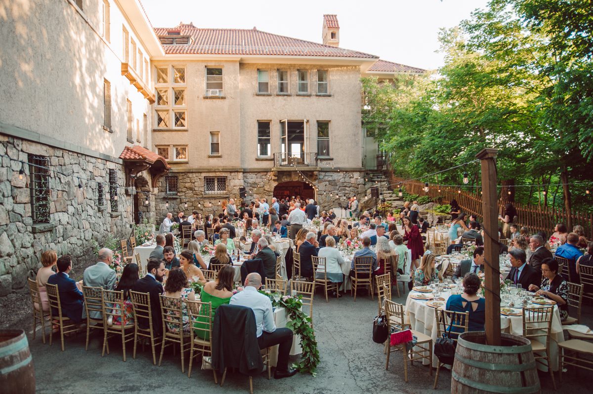 Arrow Park, a wedding venue located in Monroe NY along the Hudson Valley is truly a magical place to celebrate your wedding in a relaxing environment. Your family and friends will appreciate this unplug, retreat type of environment surrounded by nature, historic mansion with courtyard for an outdoor wedding under cafe lights, Arrow Lake, and beautiful garden. I love this place, I can come here every weekend! And Jackie and Aron were the perfect couple for this magical venue to get married and dance away the beautiful summer evening under the cafe light in their courtyard. It was like a scene from a movie, or a wedding from chateau in Italy. Jackie and Aron's Arrow Park, NY Hudson Valley NY wedding captured by Karis from Hey Karis NY, NJ, Brooklyn, Hudson Valley and Catskills Wedding and Elopement Photographer.