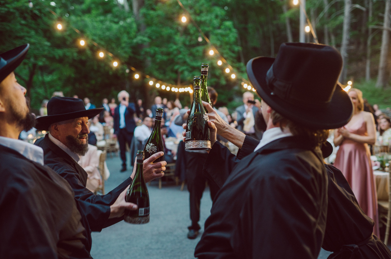 Arrow Park, a wedding venue located in Monroe NY along the Hudson Valley is truly a magical place to celebrate your wedding in a relaxing environment. Your family and friends will appreciate this unplug, retreat type of environment surrounded by nature, historic mansion with courtyard for an outdoor wedding under cafe lights, Arrow Lake, and beautiful garden. I love this place, I can come here every weekend! And Jackie and Aron were the perfect couple for this magical venue to get married and dance away the beautiful summer evening under the cafe light in their courtyard. It was like a scene from a movie, or a wedding from chateau in Italy. Jackie and Aron's Arrow Park, NY Hudson Valley NY wedding captured by Karis from Hey Karis NY, NJ, Brooklyn, Hudson Valley and Catskills Wedding and Elopement Photographer.