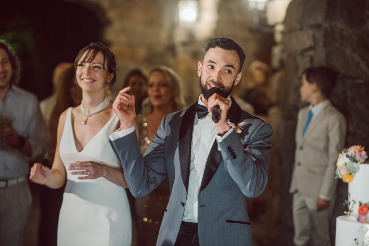 Arrow Park, a wedding venue located in Monroe NY along the Hudson Valley is truly a magical place to celebrate your wedding in a relaxing environment. Your family and friends will appreciate this unplug, retreat type of environment surrounded by nature, historic mansion with courtyard for an outdoor wedding under cafe lights, Arrow Lake, and beautiful garden. I love this place, I can come here every weekend! And Jackie and Aron were the perfect couple for this magical venue to get married and dance away the beautiful summer evening under the cafe light in their courtyard. It was like a scene from a movie, or a wedding from chateau in Italy. Jackie and Aron's Arrow Park, NY Hudson Valley NY wedding captured by Karis from Hey Karis NY, NJ, Brooklyn, Hudson Valley and Catskills Wedding and Elopement Photographer.