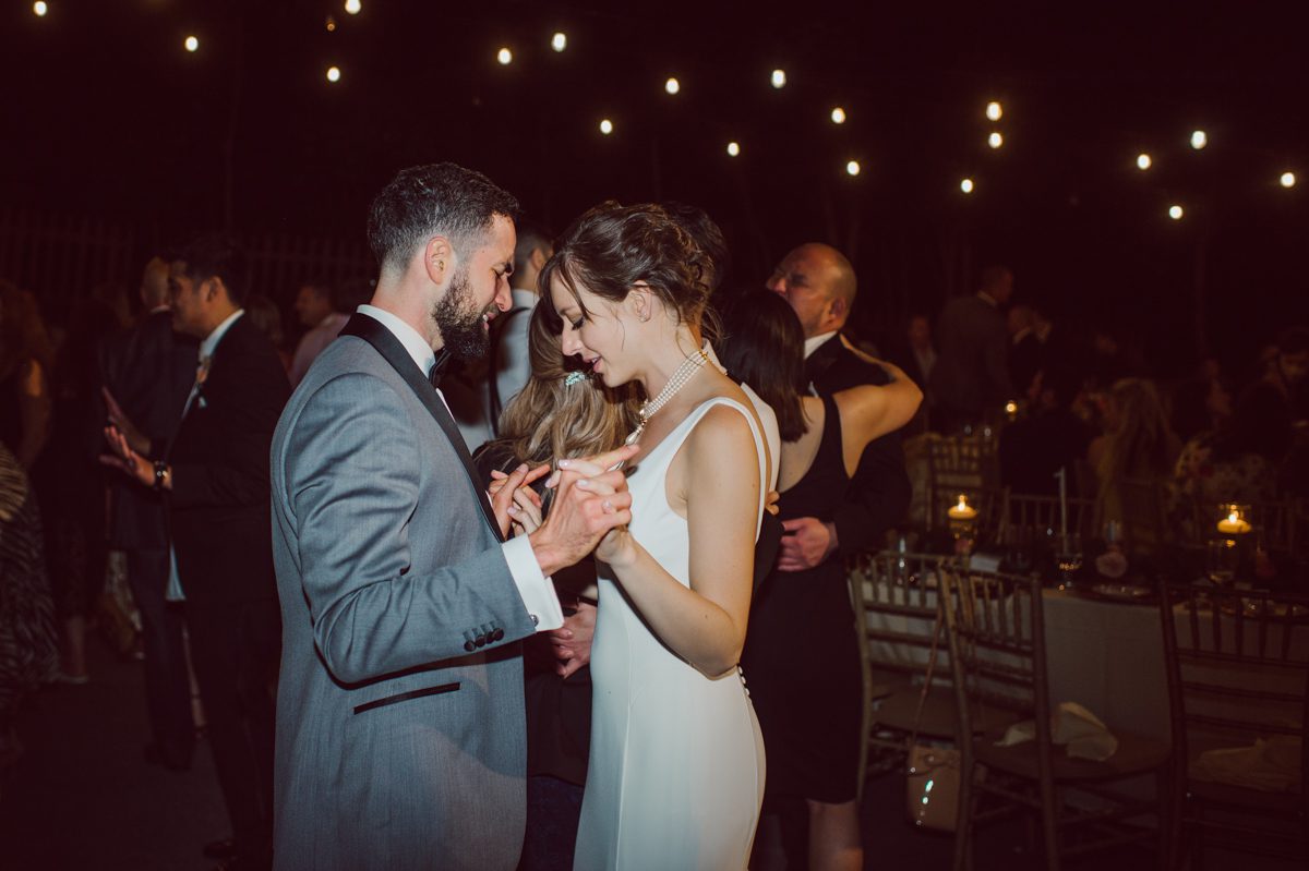 Arrow Park, a wedding venue located in Monroe NY along the Hudson Valley is truly a magical place to celebrate your wedding in a relaxing environment. Your family and friends will appreciate this unplug, retreat type of environment surrounded by nature, historic mansion with courtyard for an outdoor wedding under cafe lights, Arrow Lake, and beautiful garden. I love this place, I can come here every weekend! And Jackie and Aron were the perfect couple for this magical venue to get married and dance away the beautiful summer evening under the cafe light in their courtyard. It was like a scene from a movie, or a wedding from chateau in Italy. Jackie and Aron's Arrow Park, NY Hudson Valley NY wedding captured by Karis from Hey Karis NY, NJ, Brooklyn, Hudson Valley and Catskills Wedding and Elopement Photographer.