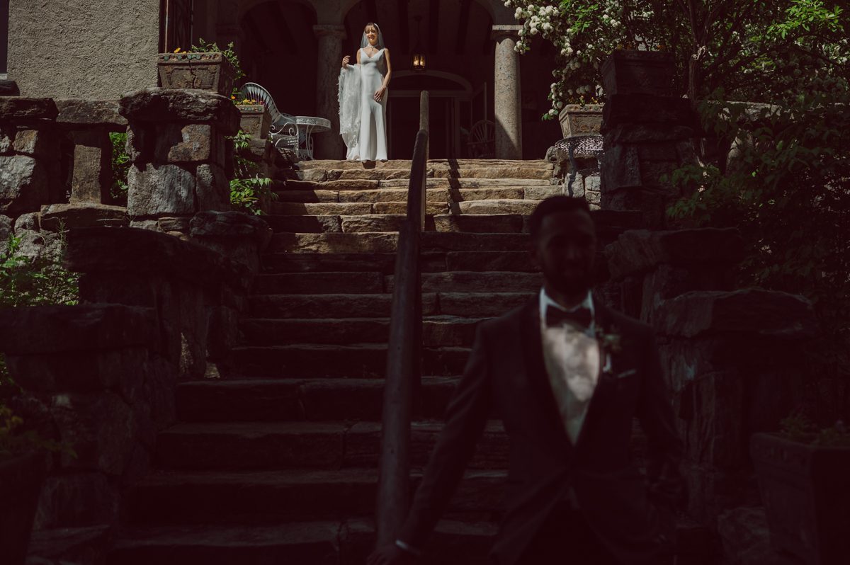 Arrow Park, a wedding venue located in Monroe NY along the Hudson Valley is truly a magical place to celebrate your wedding in a relaxing environment. Your family and friends will appreciate this unplug, retreat type of environment surrounded by nature, historic mansion with courtyard for an outdoor wedding under cafe lights, Arrow Lake, and beautiful garden. I love this place, I can come here every weekend! And Jackie and Aron were the perfect couple for this magical venue to get married and dance away the beautiful summer evening under the cafe light in their courtyard. It was like a scene from a movie, or a wedding from chateau in Italy. Jackie and Aron's Arrow Park, NY Hudson Valley NY wedding captured by Karis from Hey Karis NY, NJ, Brooklyn, Hudson Valley and Catskills Wedding and Elopement Photographer.