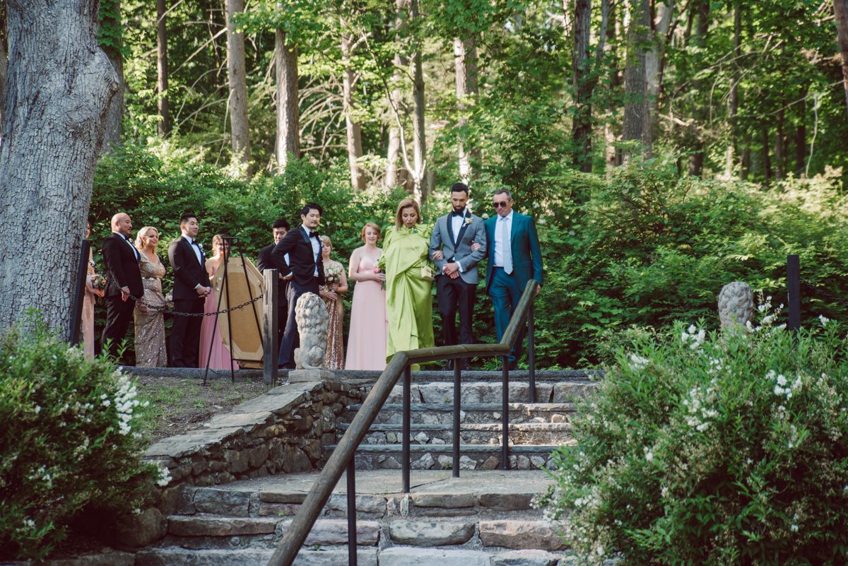 Arrow Park, a wedding venue located in Monroe NY along the Hudson Valley is truly a magical place to celebrate your wedding in a relaxing environment. Your family and friends will appreciate this unplug, retreat type of environment surrounded by nature, historic mansion with courtyard for an outdoor wedding under cafe lights, Arrow Lake, and beautiful garden. I love this place, I can come here every weekend! And Jackie and Aron were the perfect couple for this magical venue to get married and dance away the beautiful summer evening under the cafe light in their courtyard. It was like a scene from a movie, or a wedding from chateau in Italy. Jackie and Aron's Arrow Park, NY Hudson Valley NY wedding captured by Karis from Hey Karis NY, NJ, Brooklyn, Hudson Valley and Catskills Wedding and Elopement Photographer.