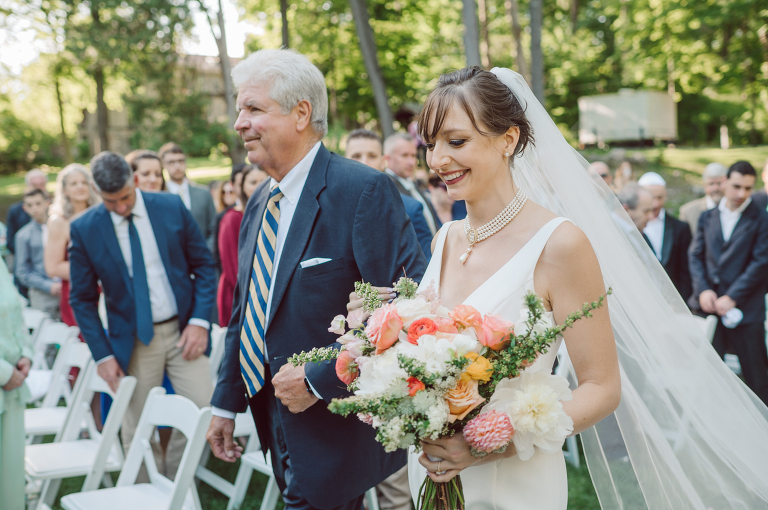 Arrow Park, a wedding venue located in Monroe NY along the Hudson Valley is truly a magical place to celebrate your wedding in a relaxing environment. Your family and friends will appreciate this unplug, retreat type of environment surrounded by nature, historic mansion with courtyard for an outdoor wedding under cafe lights, Arrow Lake, and beautiful garden. I love this place, I can come here every weekend! And Jackie and Aron were the perfect couple for this magical venue to get married and dance away the beautiful summer evening under the cafe light in their courtyard. It was like a scene from a movie, or a wedding from chateau in Italy. Jackie and Aron's Arrow Park, NY Hudson Valley NY wedding captured by Karis from Hey Karis NY, NJ, Brooklyn, Hudson Valley and Catskills Wedding and Elopement Photographer.