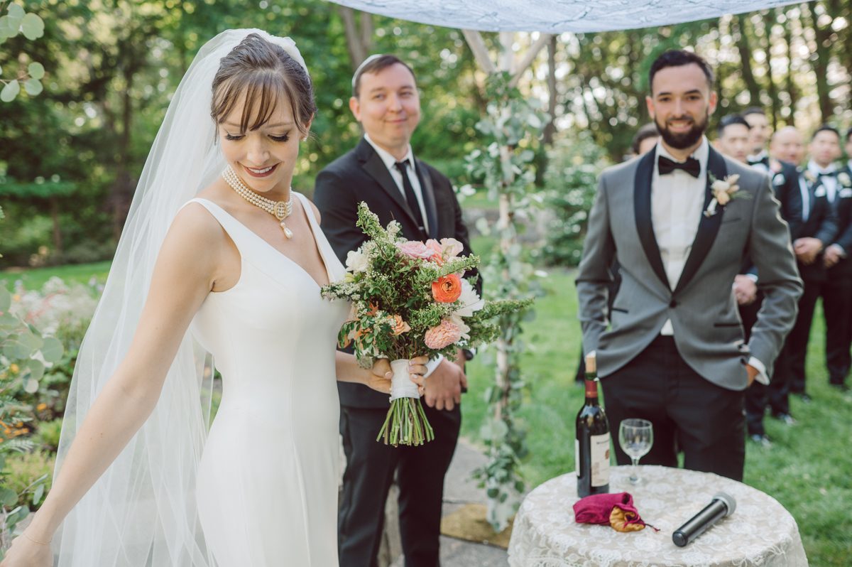 Arrow Park, a wedding venue located in Monroe NY along the Hudson Valley is truly a magical place to celebrate your wedding in a relaxing environment. Your family and friends will appreciate this unplug, retreat type of environment surrounded by nature, historic mansion with courtyard for an outdoor wedding under cafe lights, Arrow Lake, and beautiful garden. I love this place, I can come here every weekend! And Jackie and Aron were the perfect couple for this magical venue to get married and dance away the beautiful summer evening under the cafe light in their courtyard. It was like a scene from a movie, or a wedding from chateau in Italy. Jackie and Aron's Arrow Park, NY Hudson Valley NY wedding captured by Karis from Hey Karis NY, NJ, Brooklyn, Hudson Valley and Catskills Wedding and Elopement Photographer.