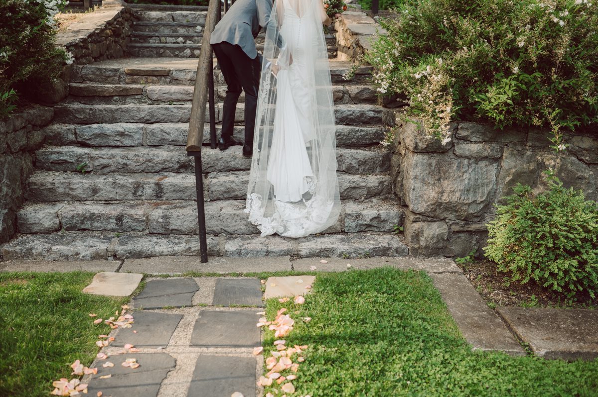 Arrow Park, a wedding venue located in Monroe NY along the Hudson Valley is truly a magical place to celebrate your wedding in a relaxing environment. Your family and friends will appreciate this unplug, retreat type of environment surrounded by nature, historic mansion with courtyard for an outdoor wedding under cafe lights, Arrow Lake, and beautiful garden. I love this place, I can come here every weekend! And Jackie and Aron were the perfect couple for this magical venue to get married and dance away the beautiful summer evening under the cafe light in their courtyard. It was like a scene from a movie, or a wedding from chateau in Italy. Jackie and Aron's Arrow Park, NY Hudson Valley NY wedding captured by Karis from Hey Karis NY, NJ, Brooklyn, Hudson Valley and Catskills Wedding and Elopement Photographer.