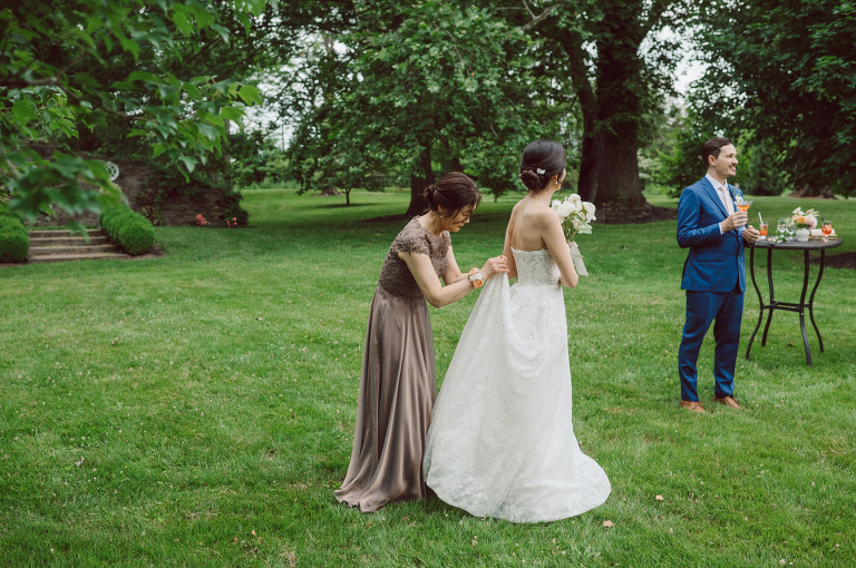 It was misting a bit while I was driving on the morning of Sunny and David's wedding at The Inn at Fernbrook Farms. The greens looked so vibrant and lovely when it's raining, at at The Inn at Fernbrook Farms all the trees, grass and all the greens were so rich. Excited to celebrate Sunny and David and create with them at this cute farm, the inn where Sunny and David will be getting ready and celebrate with their family and friends. Sunny and David did not have a long big wedding because it was not them. They also didn't have any wedding or bridal party. This low key, casual but intimate and real was what Sunny and David wanted in their wedding day and that is exactly what they got. The Inn at Fernbrook Farms Sunny and David's intimate wedding captured by Karis from Hey Karis NY, NJ, Brooklyn, Hudson Valley and Catskills Wedding and Elopement Photographer.