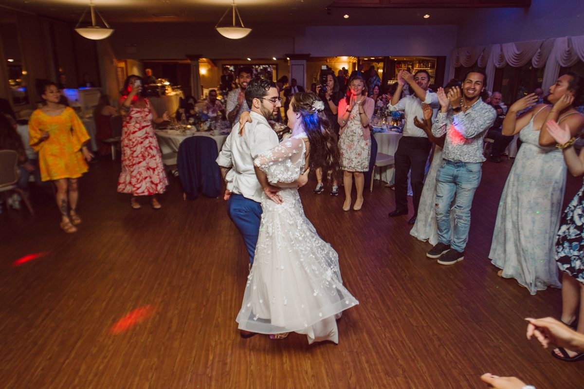 These two dancers, passionate lovers got married on a hot humid day at Auletto Caterers in Deptford NJ. Even though it was hot & humid Nina and Hector were all smiles as well as their family during the family portrait time. Wedding couple's and families that listens to you and does everything you ask them to even though the weather and environment can be tough are the BEST kind of clients! Nina and Hector were that best ideal clients, they from day one left all control regarding photo to me, did not question or have concerns. Knowing that you have this full trust and control on the wedding day makes you want to give your 100% and more. Nina and Hector are one of my top ideal clients and their wedding day photos are living proof of it. Nina and Hector's wedding day was combined of casual, mess, chaos, laughters, chill, emotional and passionate love for dancing. This was my first time at Auletto Caterers and in this part of NJ and this wedding venue in Deptford NJ was a pleasant surprise. It was full of secret locations for photos, garden, little pond where I played around with reflections, peacocks, waterfall and lavender field! Plus kind people to work with. Nina and Hector's July wedding at Auletto Caterers NJ captured by Karis from Hey Karis NY, NJ, Brooklyn, Hudson Valley and Catskills Wedding and Elopement Photographer.