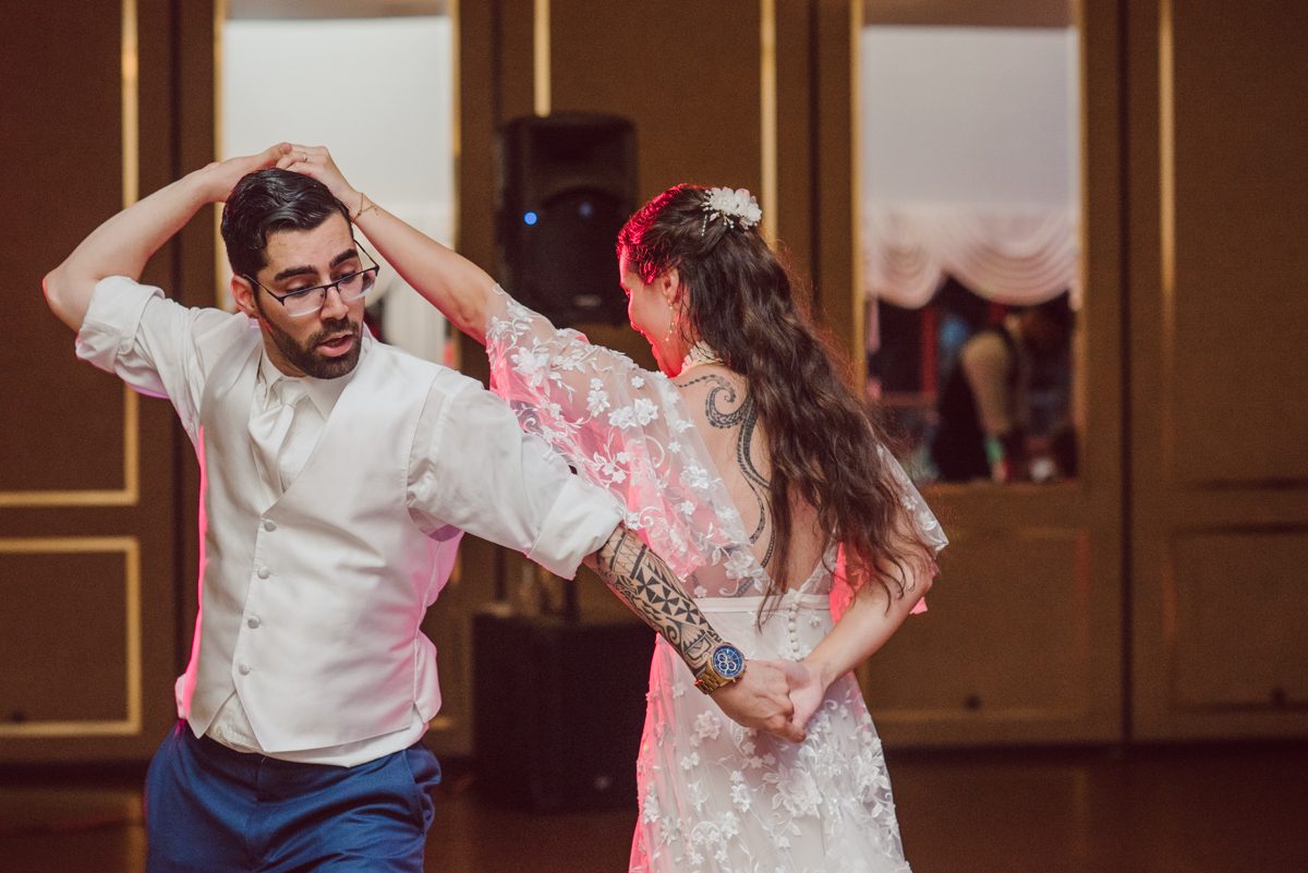 These two dancers, passionate lovers got married on a hot humid day at Auletto Caterers in Deptford NJ. Even though it was hot & humid Nina and Hector were all smiles as well as their family during the family portrait time. Wedding couple's and families that listens to you and does everything you ask them to even though the weather and environment can be tough are the BEST kind of clients! Nina and Hector were that best ideal clients, they from day one left all control regarding photo to me, did not question or have concerns. Knowing that you have this full trust and control on the wedding day makes you want to give your 100% and more. Nina and Hector are one of my top ideal clients and their wedding day photos are living proof of it. Nina and Hector's wedding day was combined of casual, mess, chaos, laughters, chill, emotional and passionate love for dancing. This was my first time at Auletto Caterers and in this part of NJ and this wedding venue in Deptford NJ was a pleasant surprise. It was full of secret locations for photos, garden, little pond where I played around with reflections, peacocks, waterfall and lavender field! Plus kind people to work with. Nina and Hector's July wedding at Auletto Caterers NJ captured by Karis from Hey Karis NY, NJ, Brooklyn, Hudson Valley and Catskills Wedding and Elopement Photographer.