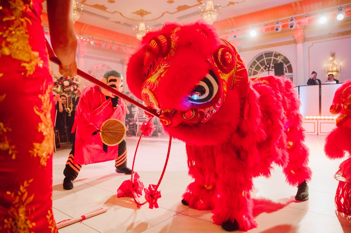 Connie and Richard who are Rick's parents inquired for their son's wedding since his son Rick and soon to be daughter in law currently lives in California and was planning their wedding in the West Coast. Connie and Richard are from here in NJ and was eager to help and plan their son's wedding here in the East Coast. Connie and Richard chose Crystal Plaza in Livingston NJ for their son's wedding venue here in NJ on October 29, 2022. Connie and Richard were delightful parents and young minded for first generation Chinese Americans, their english was fluent as well as their Chinese I was pleasantly surprised since I am second generation Korean-American and my immigrant Korean parents do not speak english that well. It was my first wedding where I did not get to meet the bride and groom till the wedding day. It made me bit nervous as I walked into the bridal suite at Crystal Plaza. But to my surprise Alison and Rick were super sweet and nice where we smoothly worked through the portrait session. Alison and Rick followed all my directions well, did everything I asked them to then it was time for PARTY! Cocktail hour at Crystal Plaza was impressive with spreads and tables of delicious food! I definitely enjoyed some of the delicious food during cocktail hour then walked into the reception room and i was WOWed. The house lights at Crystal Plaza was beautiful and it was actually amazing that I didn't even use my own lights. The mixture of house lights, fog and spotlights at Crystal Plaza was actually fabulous and I was very impressed. The house lights at Crystal Plaza made shutter drag dancing photos with double exposure so much fun and amazing! Alison and Rick, actually Connie and Richard even hired Chinese Lion Dancers for the reception and all the guests loved it. The energy during Alison and Rick's wedding reception was on FIRE! Everyone and anyone was on the dance floor dancing like it was their last one. I truly had a blast during Alison and Rick's wedding at Crystal Plaza in Livingston NJ and looking forward to going back to Crystal Plaza soon. Alison and Rick's Crystal Plaza in Livingston NJ wedding captured by Karis from Hey Karis New York, Brooklyn, Hudson Valley and Catskills Wedding Photographer and NYC Elopement Photographer.