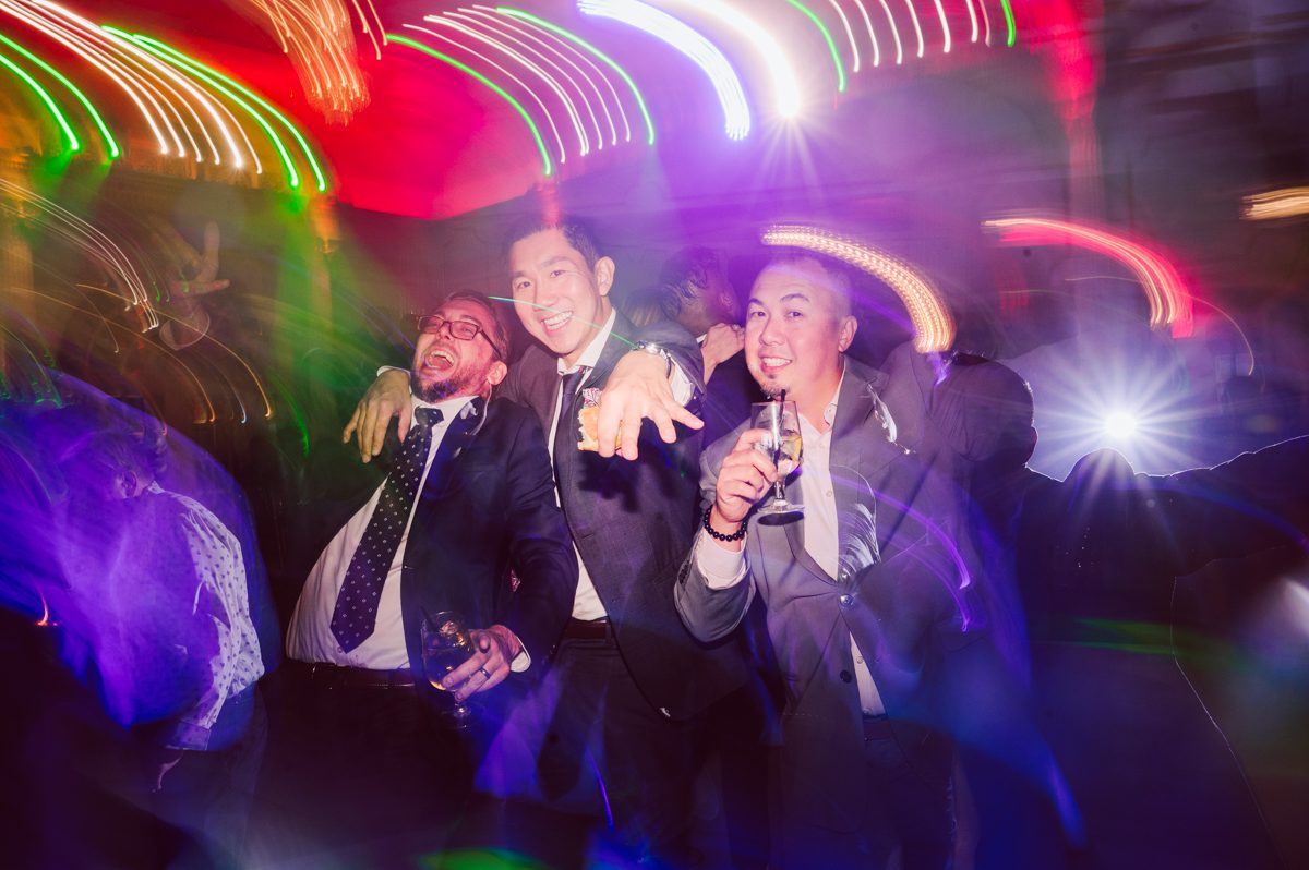 Connie and Richard who are Rick's parents inquired for their son's wedding since his son Rick and soon to be daughter in law currently lives in California and was planning their wedding in the West Coast. Connie and Richard are from here in NJ and was eager to help and plan their son's wedding here in the East Coast. Connie and Richard chose Crystal Plaza in Livingston NJ for their son's wedding venue here in NJ on October 29, 2022. Connie and Richard were delightful parents and young minded for first generation Chinese Americans, their english was fluent as well as their Chinese I was pleasantly surprised since I am second generation Korean-American and my immigrant Korean parents do not speak english that well. It was my first wedding where I did not get to meet the bride and groom till the wedding day. It made me bit nervous as I walked into the bridal suite at Crystal Plaza. But to my surprise Alison and Rick were super sweet and nice where we smoothly worked through the portrait session. Alison and Rick followed all my directions well, did everything I asked them to then it was time for PARTY! Cocktail hour at Crystal Plaza was impressive with spreads and tables of delicious food! I definitely enjoyed some of the delicious food during cocktail hour then walked into the reception room and i was WOWed. The house lights at Crystal Plaza was beautiful and it was actually amazing that I didn't even use my own lights. The mixture of house lights, fog and spotlights at Crystal Plaza was actually fabulous and I was very impressed. The house lights at Crystal Plaza made shutter drag dancing photos with double exposure so much fun and amazing! Alison and Rick, actually Connie and Richard even hired Chinese Lion Dancers for the reception and all the guests loved it. The energy during Alison and Rick's wedding reception was on FIRE! Everyone and anyone was on the dance floor dancing like it was their last one. I truly had a blast during Alison and Rick's wedding at Crystal Plaza in Livingston NJ and looking forward to going back to Crystal Plaza soon. Alison and Rick's Crystal Plaza in Livingston NJ wedding captured by Karis from Hey Karis New York, Brooklyn, Hudson Valley and Catskills Wedding Photographer and NYC Elopement Photographer.