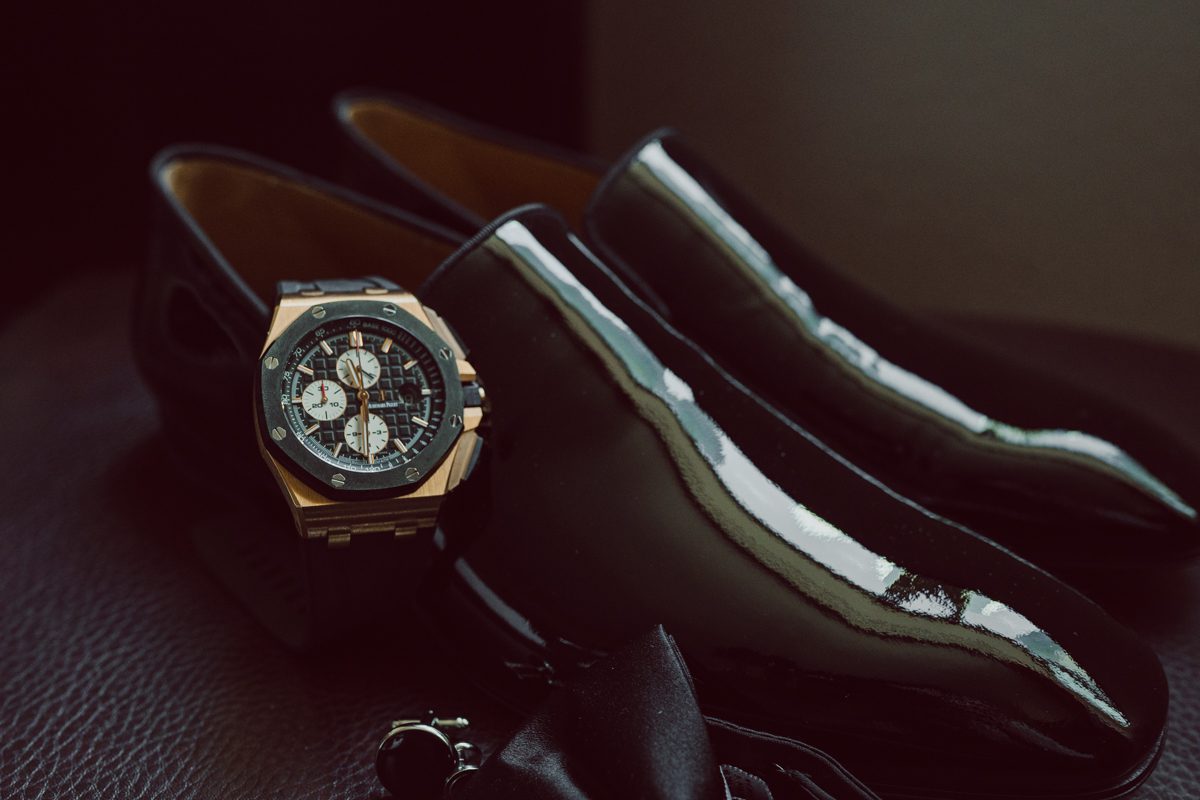 Duffield St, Brooklyn on November 19 even though it's Saturday morning it was still very busy. But luckily I found street parking right on Duffield St in front of Sheraton Downtown Brooklyn which was where I needed to be for Ariana and Jon's wedding prep. Vicky from VickyC5 hair/makeup team was there beautifying the ladies, I went straight to flat lays of Ariana's wedding details such as rings, jewelry and her wedding invitations. I use ribbons, extra loose flowers to make the flat lays more fine art looking. Once all the details are done, my full focus goes to the bride Ariana and her ladies. Ariana and Jon were planning to do a Chinese Door Game at the hotel room, so as soon as Ariana was ready in her Hanbok (Korean Traditional Wedding Outfit) Jon and his groomsmen arrived at the door. With Ariana's bridal suite crowded with too many people Ariana's bridesmaids started to give instructions to the games that Jon and his groomsmen need to play in order to get through the second door so that Jon can meet/see his bride Ariana. While the games are happening outside Ariana's door one of the bridesmaid has her phone on FaceTime so that Ariana can see how the men are doing during all the door games. I of course had my second shooter inside the room with Ariana to get her reactions which was hilarious. After the door games, we then moved to a conference room of at Sheraton Downtown Brooklyn for Ariana and Jon's Chinese Tea Pouring Ceremony (this is Jon's Chinese side's wedding tradition where you pour tea to all the elders in the family). Once all the Chines and Korean wedding traditions are over, we all rushed to Brooklyn Botanical Garden. Traffic from Sheraton Downtown Brooklyn to Brooklyn Botanical Garden was pretty bad, as usual. Once I arrived there of course was no street parking available near the entrance and parking lot for Brooklyn Botanical Garden was way too far for me to carry all the gears. After driving around I found one spot few blocks away from the Brooklyn Botanical Garden entrance. Brooklyn Botanical Garden was busy with Lightscape preparation and installation which we were not allowed to photograph so we were left with very little options for wedding portrait backdrop, plus it was COLD and we were looking light! These are important things to consider when you are planning for Winter wedding. I worked as quickly as possible with Ariana and Jon's first look and bridal party photos. Then we stayed inside for family photos since elders did not wanted to go outside which I totally don't blame. Then I quickly took Ariana and Jon outside for bit more couple's portraits then it was time for the wedding ceremony. Ariana and Jon's wedding ceremony held place at The Palm House at Brooklyn Botanical Garden, but because it was an winter wedding we've lost all the light and I had to use my video lights but over all the ceremony was beautiful and Oh Fleur NYC did absolutely an amazing job with ceremony decor (floral/candles). The Palm House was empty again, OhfleurNYC as well as Brooklyn Botanical Garden staff were busy turning the room. Oh Fleur NYC's Jessica's talent was amazing her usage of floral, choice of colors and mixing the floral with tall candles were magical. Turned The Palm House into a beautiful and romantic garden. Warmth of candles, peach and pinks of flowers all blended so well turning the Palm House at Brooklyn Botanical Garden in to fairytale floral ballroom. Ariana and Jon attended cocktail enjoying their time with friends and family before their wedding reception at The Palm House. Ariana and Jon's wedding at The Palm House at Brooklyn Botanical Garden documented by Karis from Hey Karis New York, Brooklyn, Hudson Valley and Catskills Wedding Photographer and NYC Elopement Photographer.