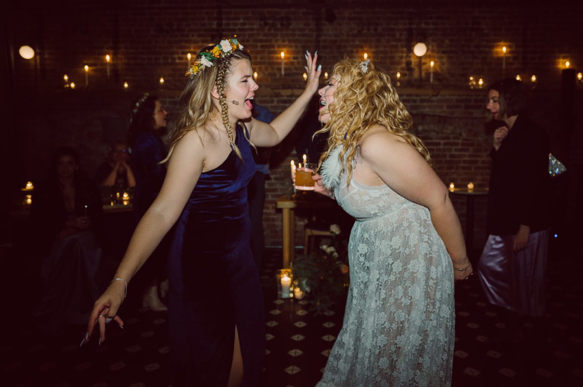 Since it was Friday and I did not wanted to get stuck in morning rush hour, I left for Brooklyn early! Friday December 2, I was on my way to document my last wedding of 2022 at Wythe Hotel in Brooklyn NY. I knew today was going to be great not just because I am photographing my last wedding of 2022 at Wythe Hotel in Brooklyn NY but because we are celebrating Jenny and Anderson two beautiful, pure and amazing human beings who are madly in love. Jenny is hairstylist for TV and Film where she gets to work with actors and actresses, she goes by JT Franchuk and some of her clients include Susan Sarandon in Maybe I do, Chloe Moretz in The Peripheral on Netflix as well as Halston also on Netflix. And Anderson is from Columbia, where he self taught himself during the pandemic and recently got a job at JP Morgan. These two amazingly talented and genuine lovers wedding day was finally here and I was here for all that they had planned for their wedding at Wythe Hotel Brooklyn NY. Jenny got ready at an airbnb on Vernon Ave and Anderson was getting a fresh cut at Cotter Barber Shop on Graham Ave. Jenny and Anderson's wedding day ran so smoothly due to amazing planner Cristina from Carismas Design. Jenny and Anderson's first look at Cooper Room at Wythe Hotel, then Jenny had her first look with her father and grandfather which was very emotional. The with Jenny and Anderson we walked around Wythe Hotel to do some more wedding portrait. Jenny and Anderson's cocktail hour was held at Pent House Loft/ Loft Room at Wythe Hotel then we all headed back down to Cooper Room Cellar for Jenny and Anderson's wedding reception. Jenny and Anderson's Wythe Hotel Brooklyn NY wedding documented by Karis from Hey Karis New York, Brooklyn, Hudson Valley and Catskills Wedding Photographer and NYC Elopement Photographer.