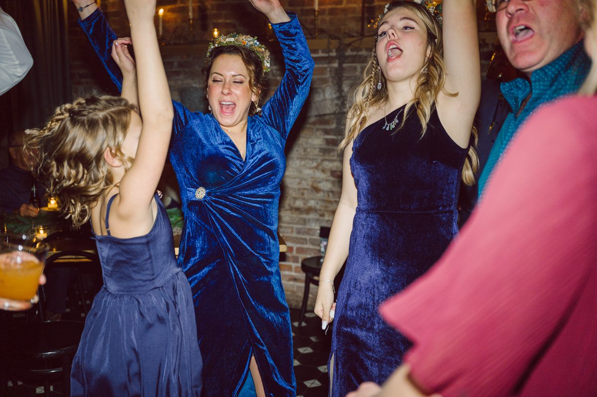 Since it was Friday and I did not wanted to get stuck in morning rush hour, I left for Brooklyn early! Friday December 2, I was on my way to document my last wedding of 2022 at Wythe Hotel in Brooklyn NY. I knew today was going to be great not just because I am photographing my last wedding of 2022 at Wythe Hotel in Brooklyn NY but because we are celebrating Jenny and Anderson two beautiful, pure and amazing human beings who are madly in love. Jenny is hairstylist for TV and Film where she gets to work with actors and actresses, she goes by JT Franchuk and some of her clients include Susan Sarandon in Maybe I do, Chloe Moretz in The Peripheral on Netflix as well as Halston also on Netflix. And Anderson is from Columbia, where he self taught himself during the pandemic and recently got a job at JP Morgan. These two amazingly talented and genuine lovers wedding day was finally here and I was here for all that they had planned for their wedding at Wythe Hotel Brooklyn NY. Jenny got ready at an airbnb on Vernon Ave and Anderson was getting a fresh cut at Cotter Barber Shop on Graham Ave. Jenny and Anderson's wedding day ran so smoothly due to amazing planner Cristina from Carismas Design. Jenny and Anderson's first look at Cooper Room at Wythe Hotel, then Jenny had her first look with her father and grandfather which was very emotional. The with Jenny and Anderson we walked around Wythe Hotel to do some more wedding portrait. Jenny and Anderson's cocktail hour was held at Pent House Loft/ Loft Room at Wythe Hotel then we all headed back down to Cooper Room Cellar for Jenny and Anderson's wedding reception. Jenny and Anderson's Wythe Hotel Brooklyn NY wedding documented by Karis from Hey Karis New York, Brooklyn, Hudson Valley and Catskills Wedding Photographer and NYC Elopement Photographer.