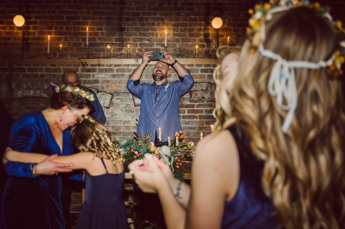 Since it was Friday and I did not wanted to get stuck in morning rush hour, I left for Brooklyn early! Friday December 2, I was on my way to document my last wedding of 2022 at Wythe Hotel in Brooklyn NY. I knew today was going to be great not just because I am photographing my last wedding of 2022 at Wythe Hotel in Brooklyn NY but because we are celebrating Jenny and Anderson two beautiful, pure and amazing human beings who are madly in love. Jenny is hairstylist for TV and Film where she gets to work with actors and actresses, she goes by JT Franchuk and some of her clients include Susan Sarandon in Maybe I do, Chloe Moretz in The Peripheral on Netflix as well as Halston also on Netflix. And Anderson is from Columbia, where he self taught himself during the pandemic and recently got a job at JP Morgan. These two amazingly talented and genuine lovers wedding day was finally here and I was here for all that they had planned for their wedding at Wythe Hotel Brooklyn NY. Jenny got ready at an airbnb on Vernon Ave and Anderson was getting a fresh cut at Cotter Barber Shop on Graham Ave. Jenny and Anderson's wedding day ran so smoothly due to amazing planner Cristina from Carismas Design. Jenny and Anderson's first look at Cooper Room at Wythe Hotel, then Jenny had her first look with her father and grandfather which was very emotional. The with Jenny and Anderson we walked around Wythe Hotel to do some more wedding portrait. Jenny and Anderson's cocktail hour was held at Pent House Loft/ Loft Room at Wythe Hotel then we all headed back down to Cooper Room Cellar for Jenny and Anderson's wedding reception. Jenny and Anderson's Wythe Hotel Brooklyn NY wedding documented by Karis from Hey Karis New York, Brooklyn, Hudson Valley and Catskills Wedding Photographer and NYC Elopement Photographer.